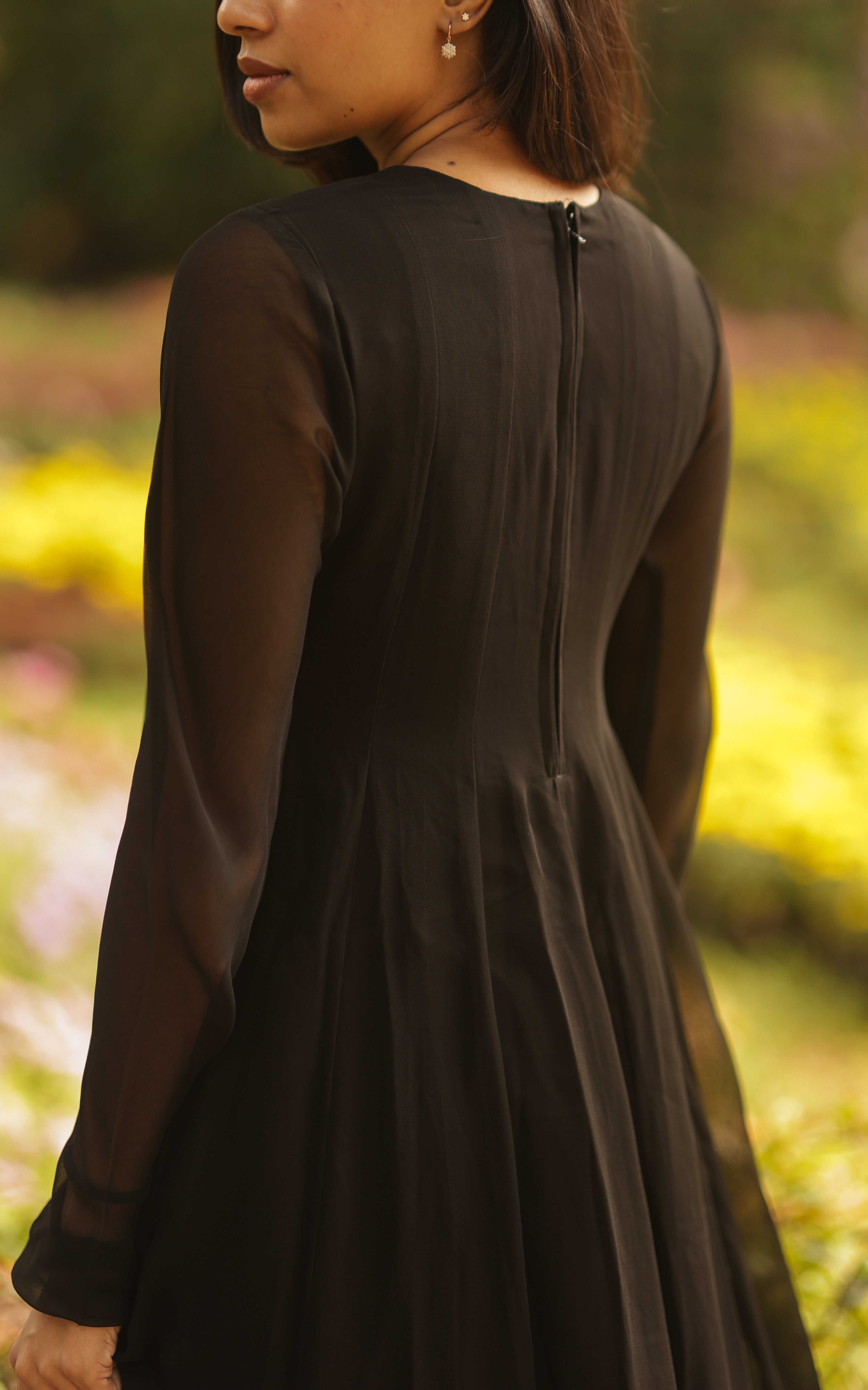 Elegant kurti featuring a back zipper closure, designed for a perfect fit. The zip ensures a sleek and tailored look, ideal for a stylish and comfortable appearance.