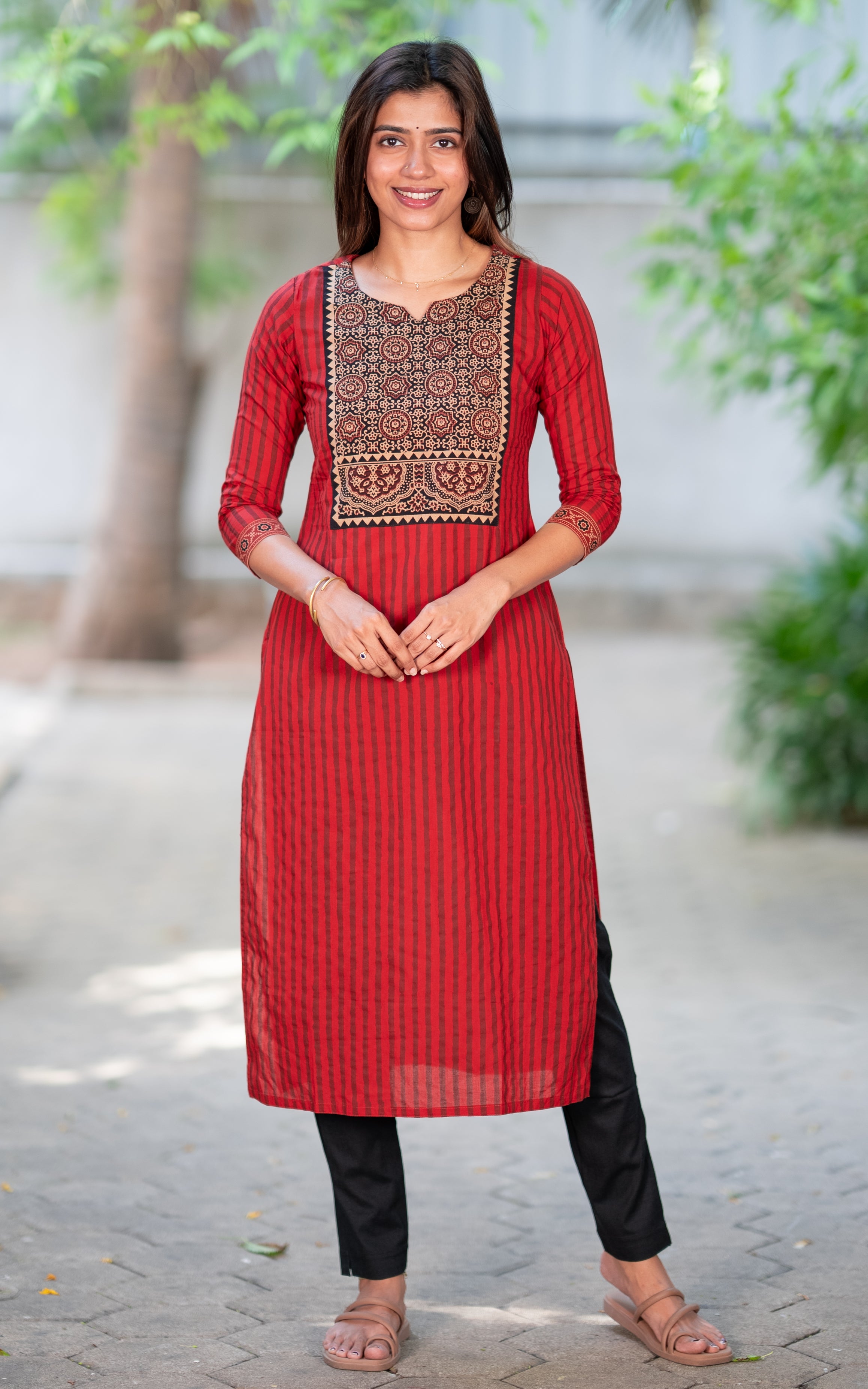 Thalir Maroon