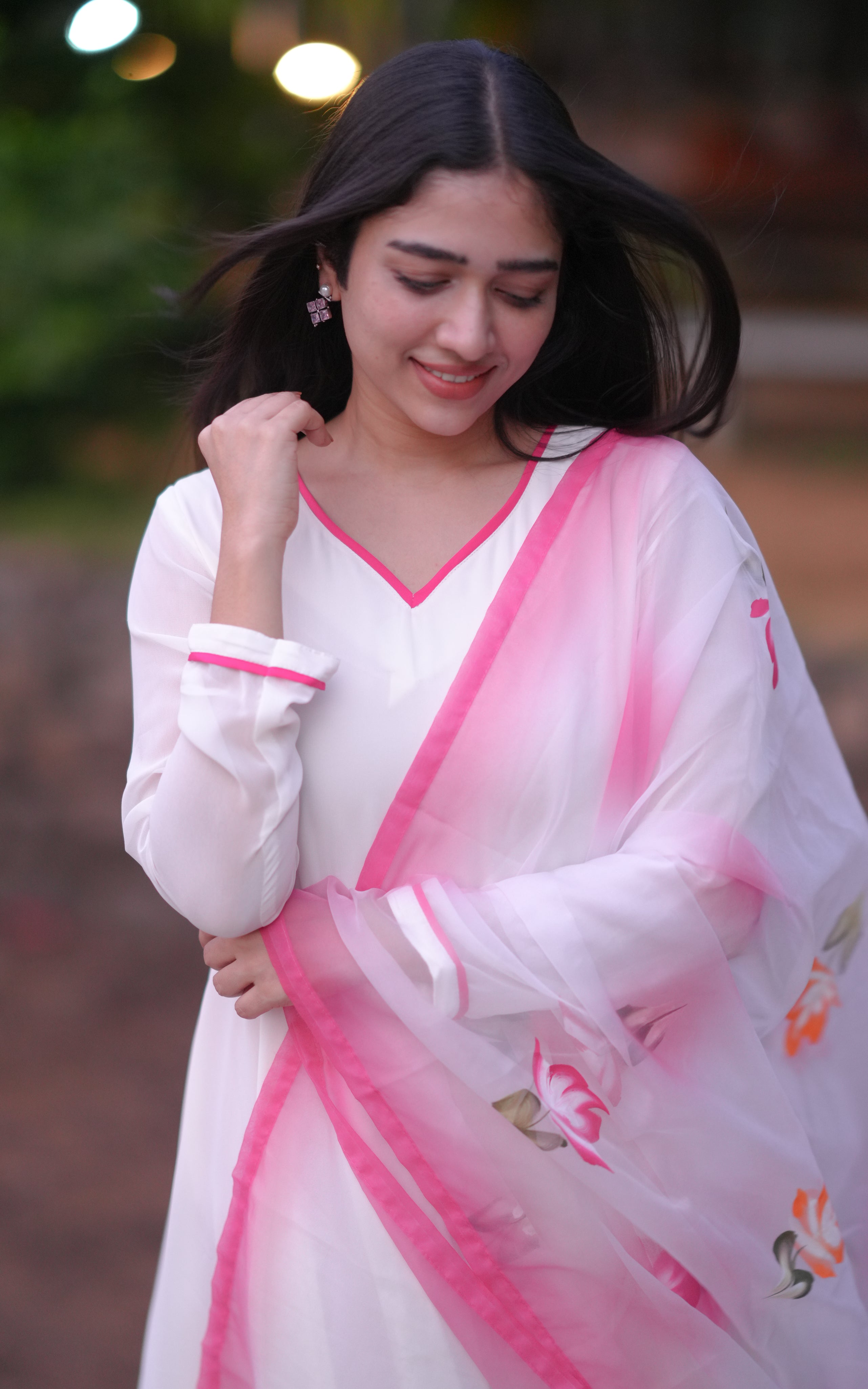 Elegant White base with Pink accents.