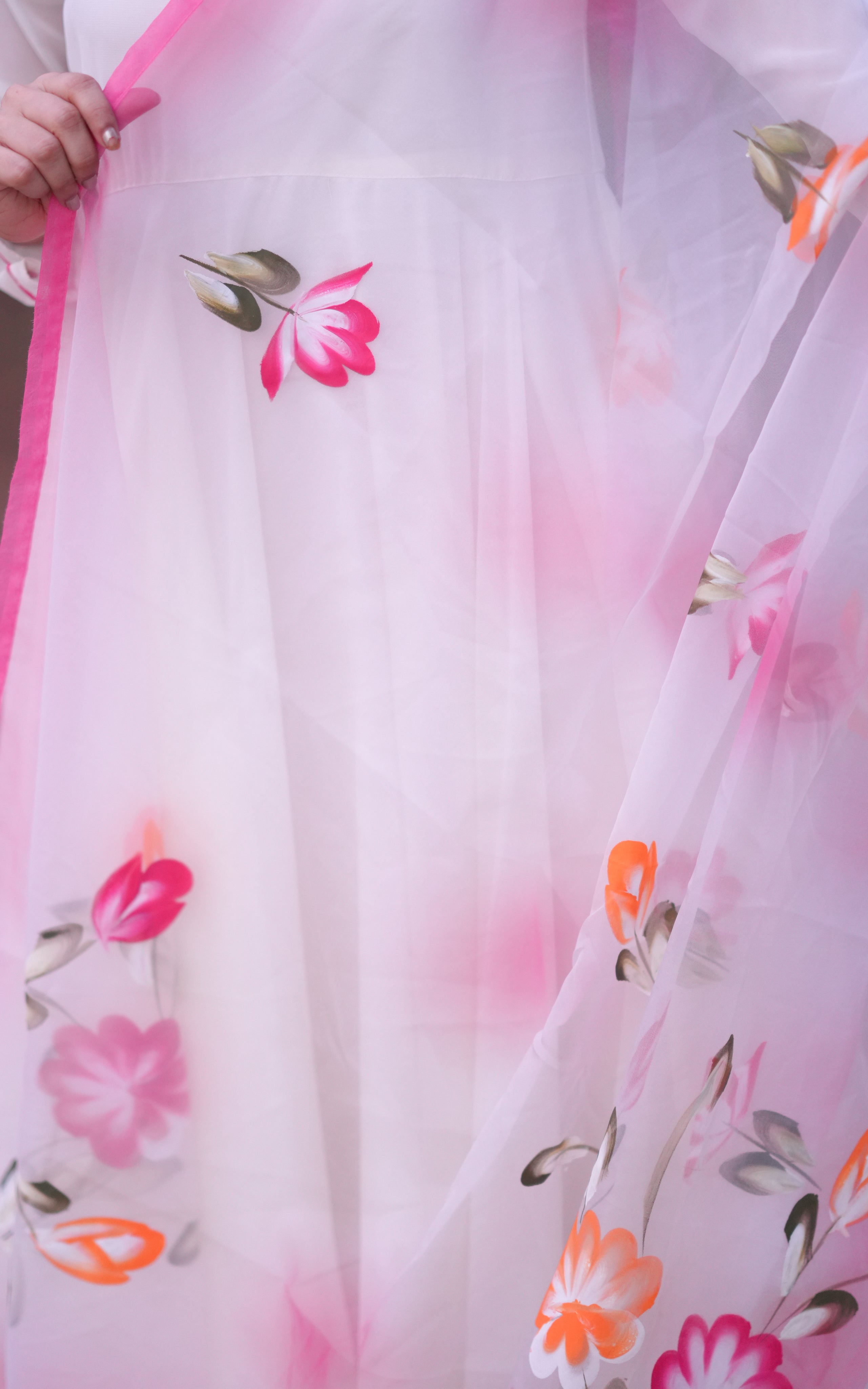 Soft Organza Dupatta with floral print adds a romantic touch.