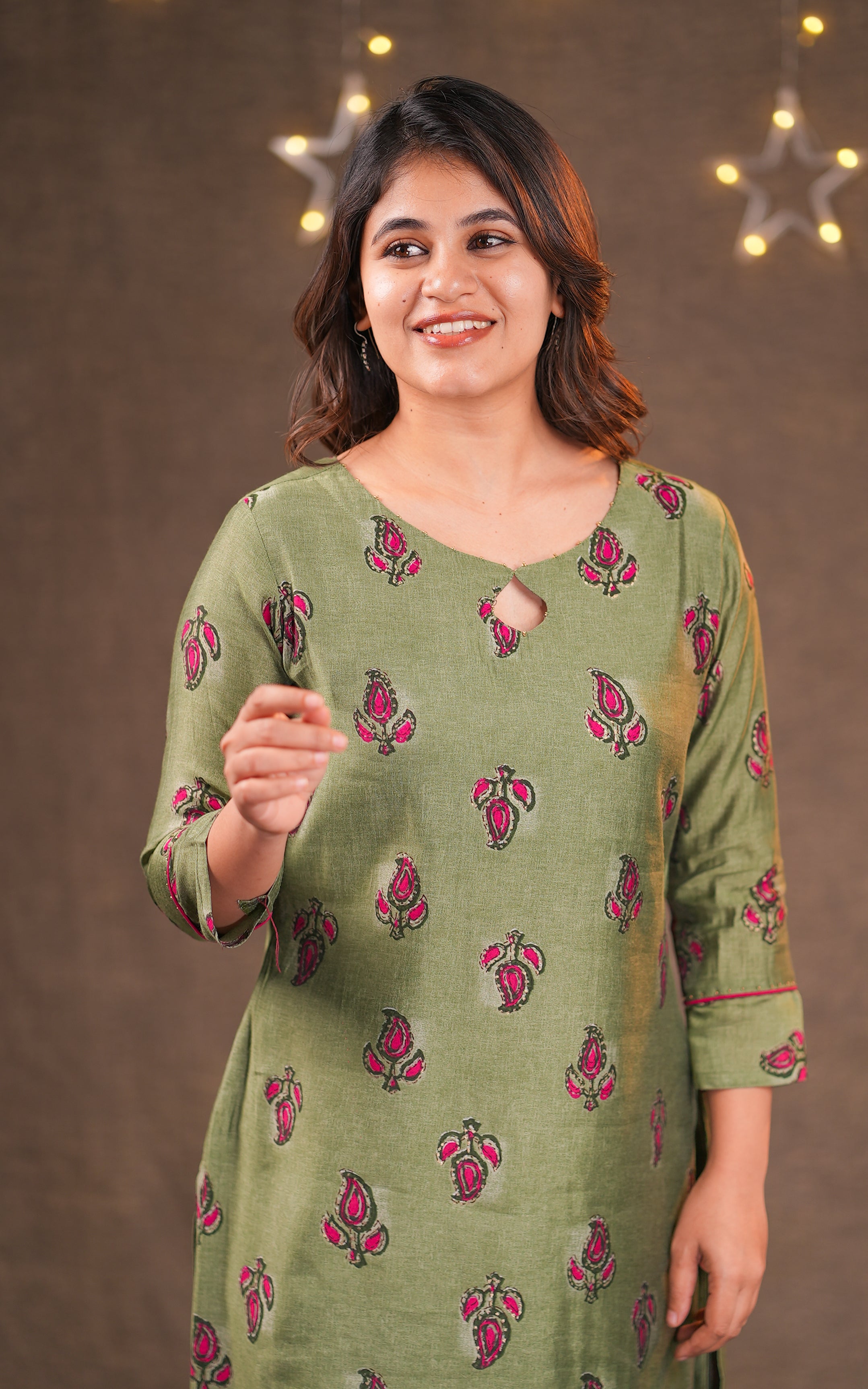 Instore - Olive & Green Color Art Silk Straight Cut kurti designed with a stylish keyhole neckline & Cotton Lining