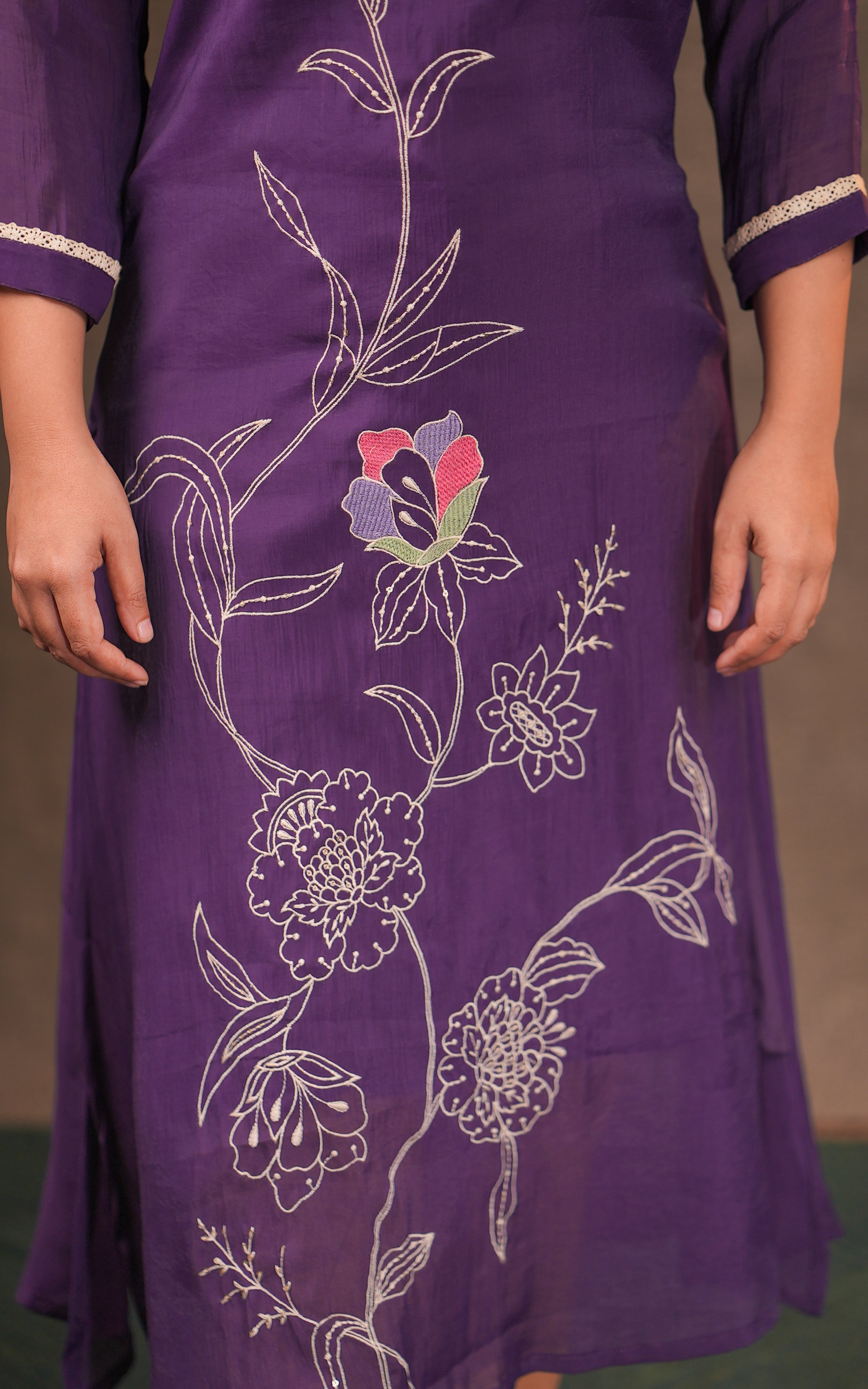 Purple dress with floral embroidery