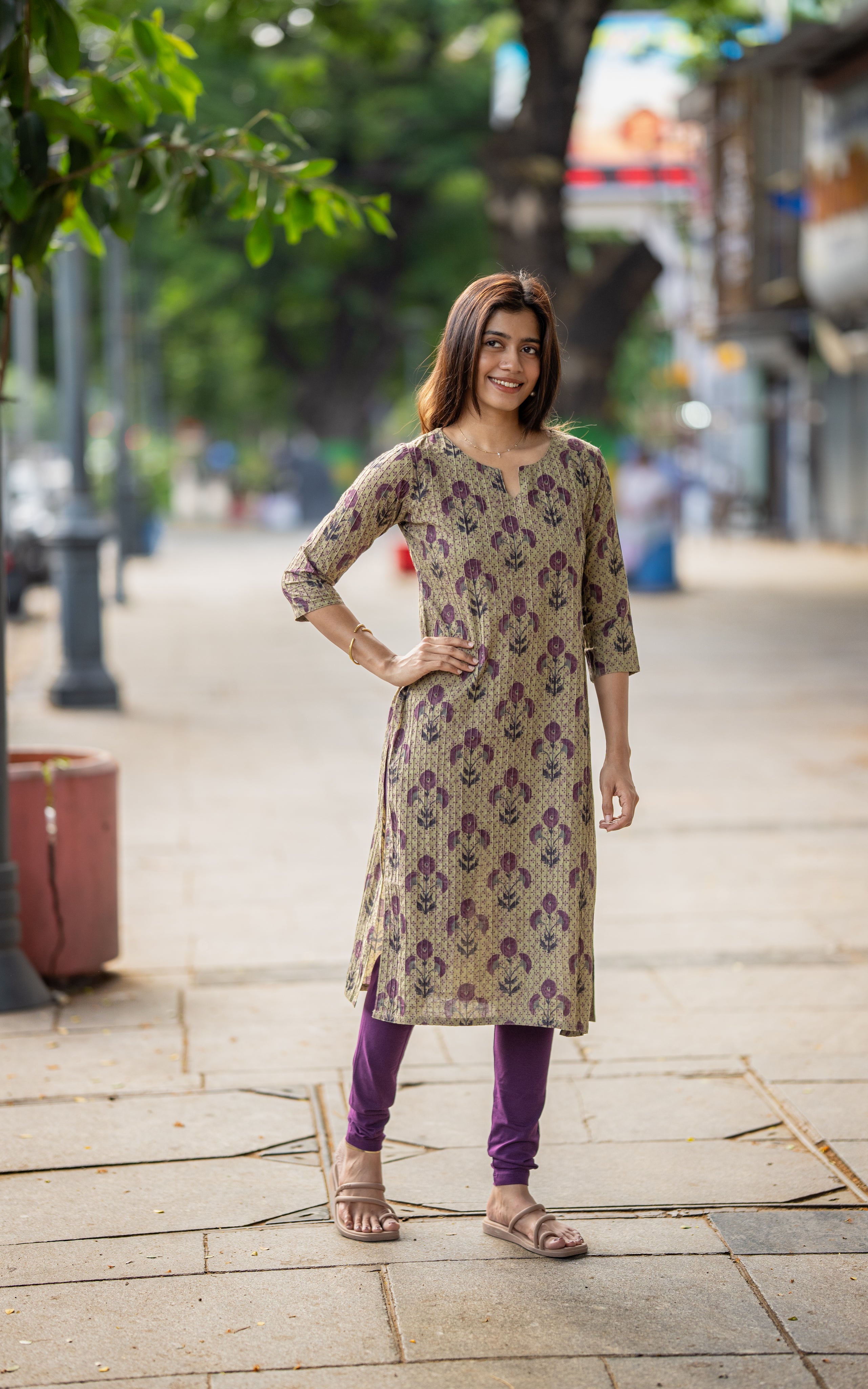 Nisha B