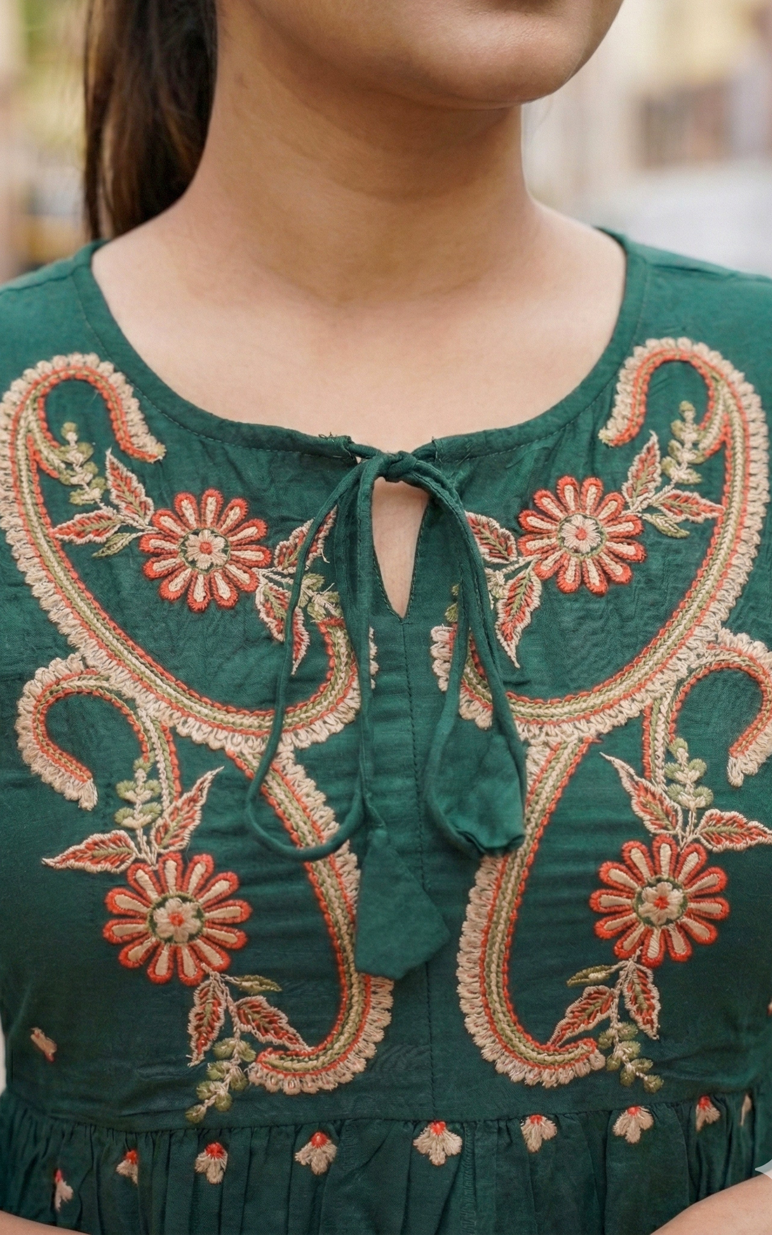 Instore - Dark Green Color Cotton Floral Embroidered Peplum Top with Tie-Up Neckline & Cotton Lining on Yoke