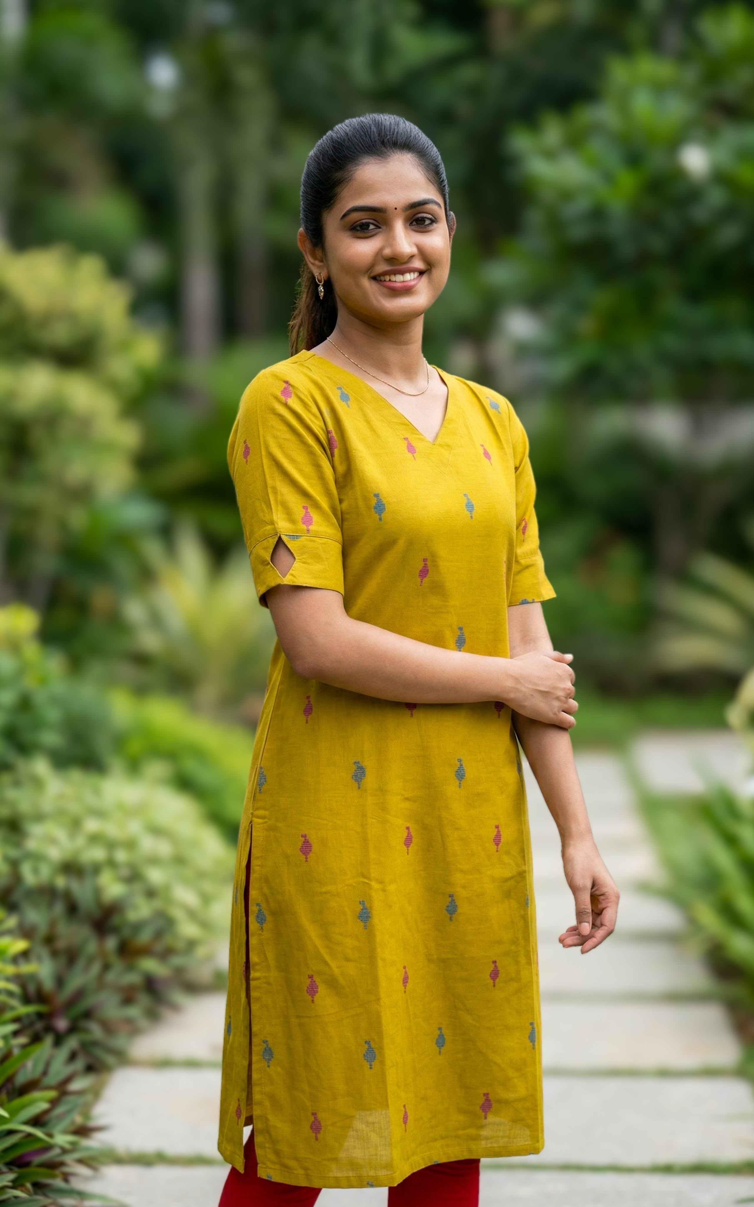 stylish green cotton kurti for college
trendy v-neck straight cut kurti
modern casual cotton kurti with side slit
fashionable cotton kurti with cutwork