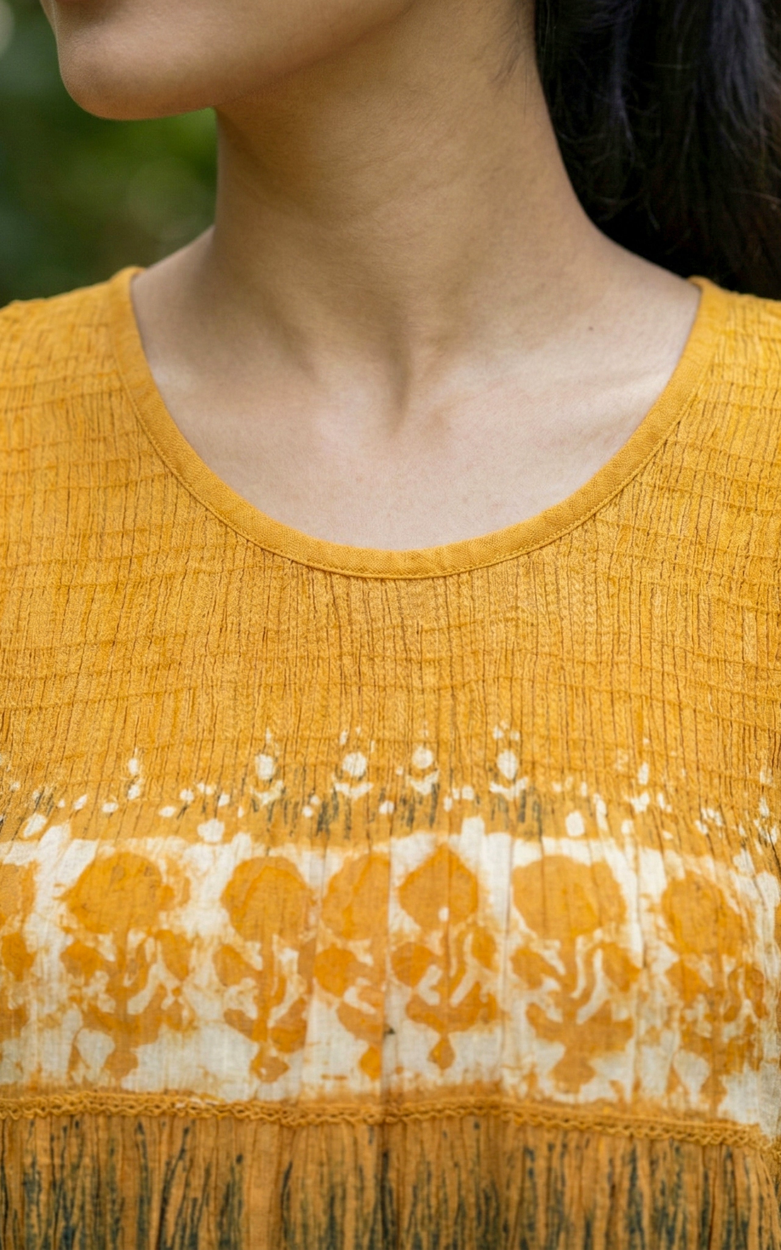 Mustard smocked Indo Western maxi dress made from viscose fabric