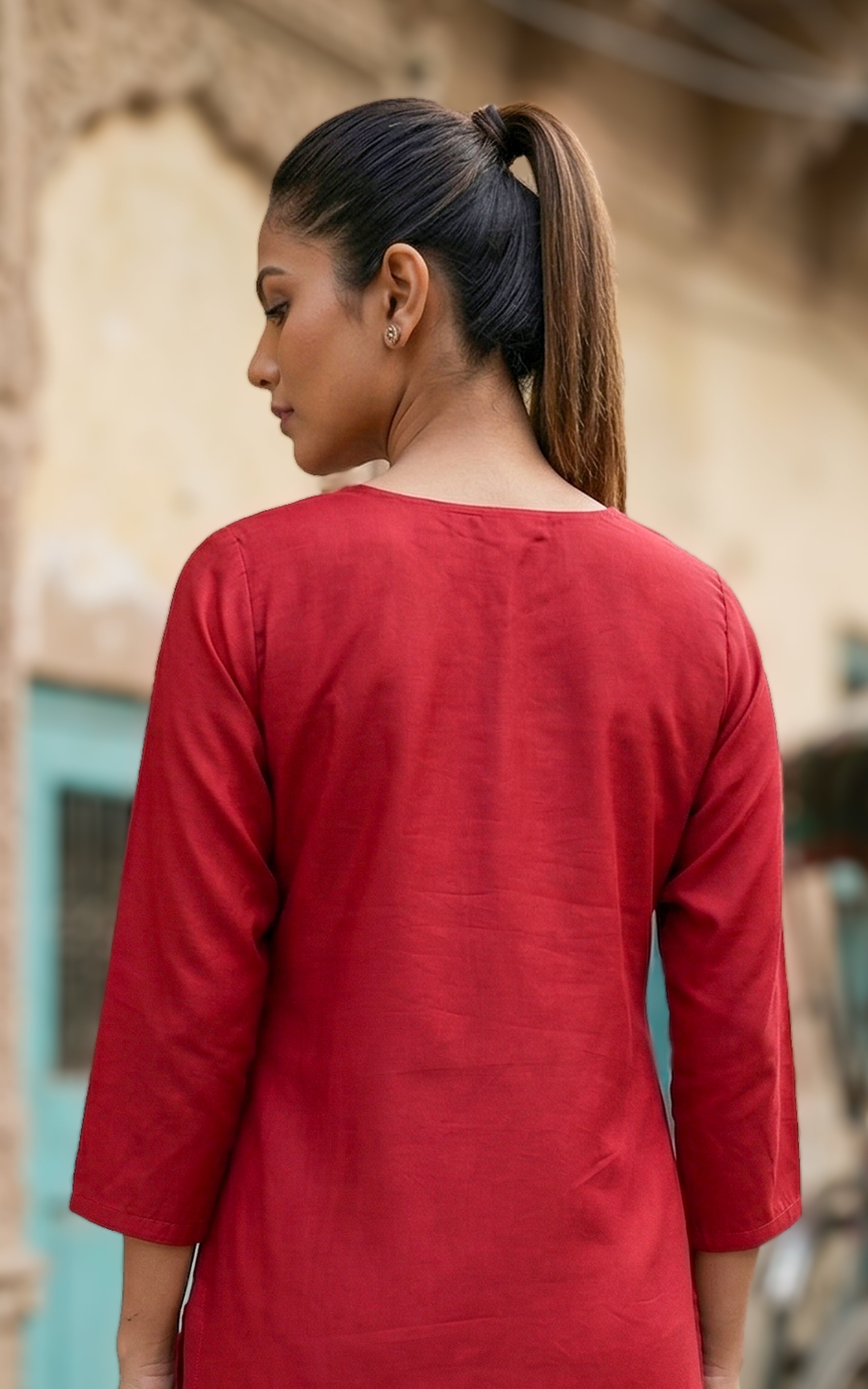 Back Neckline Features a Modest Round Shape