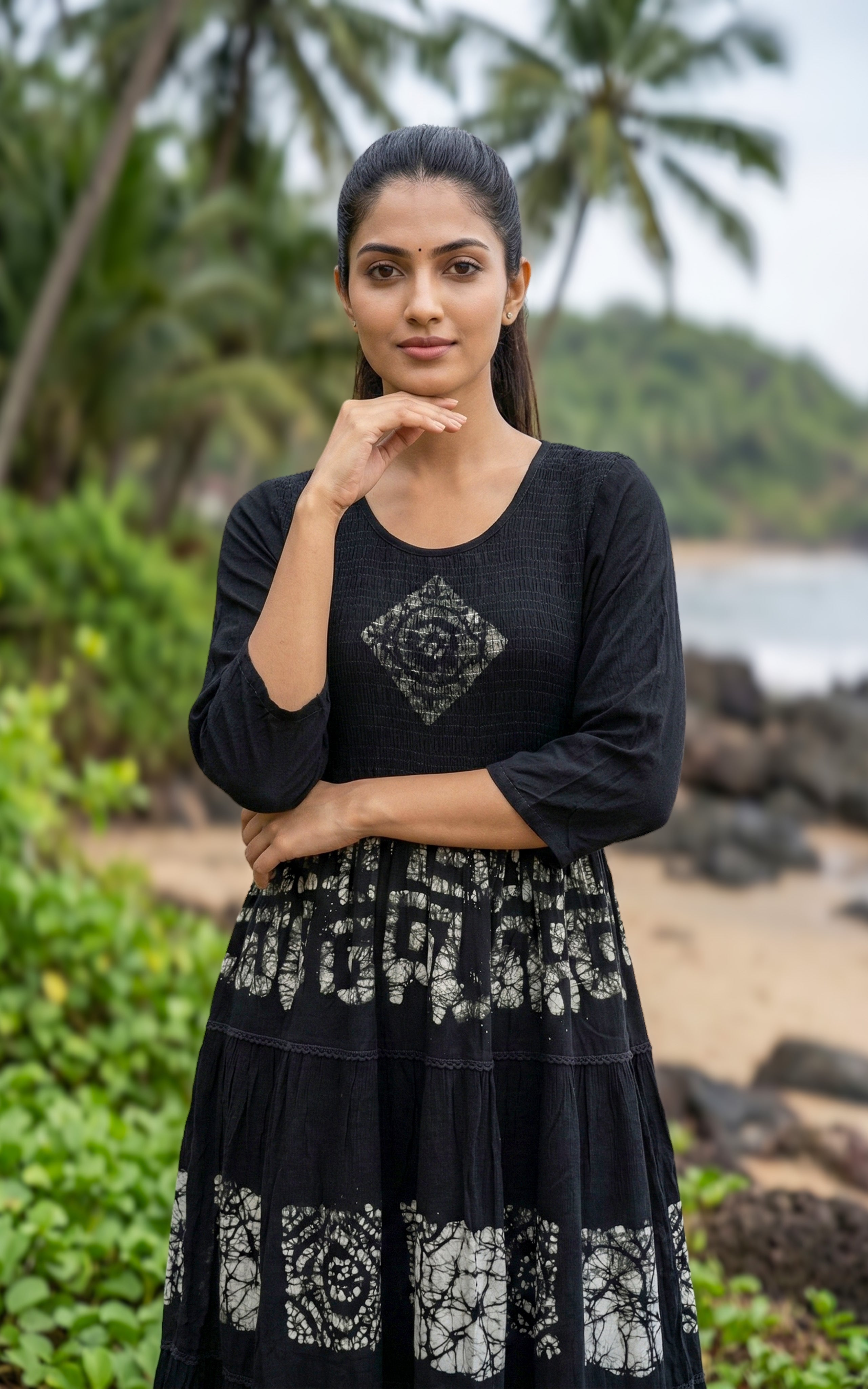 Black smocked Indo Western maxi dress made from viscose fabric.