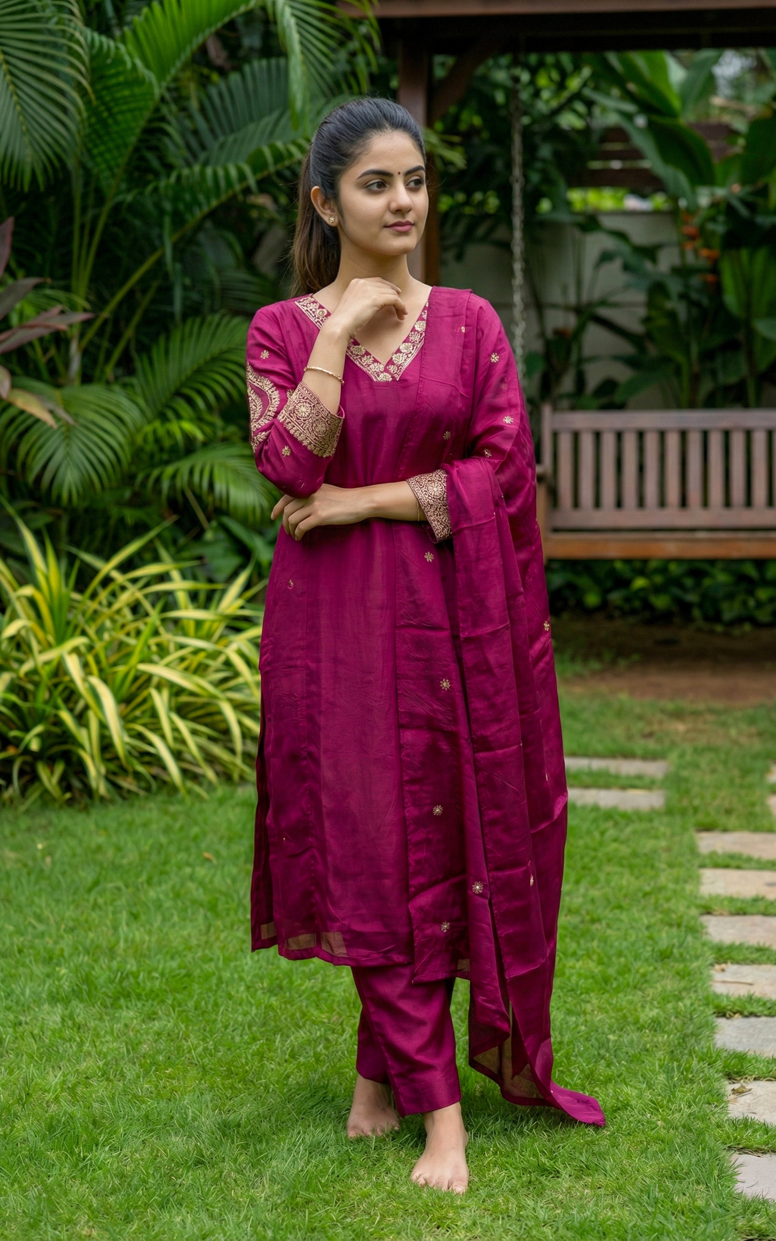 Woman in a magenta traditional outfit