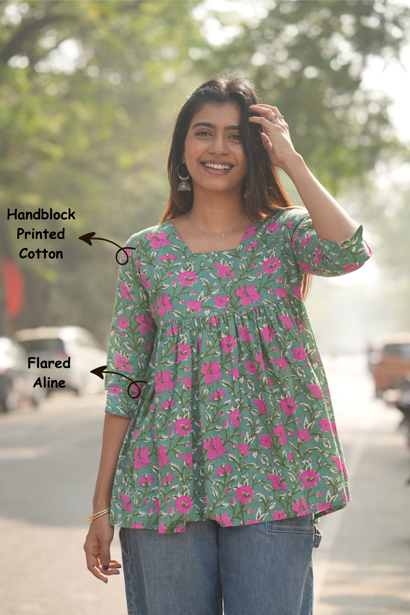 Women’s green hand block printed cotton A-line short top.