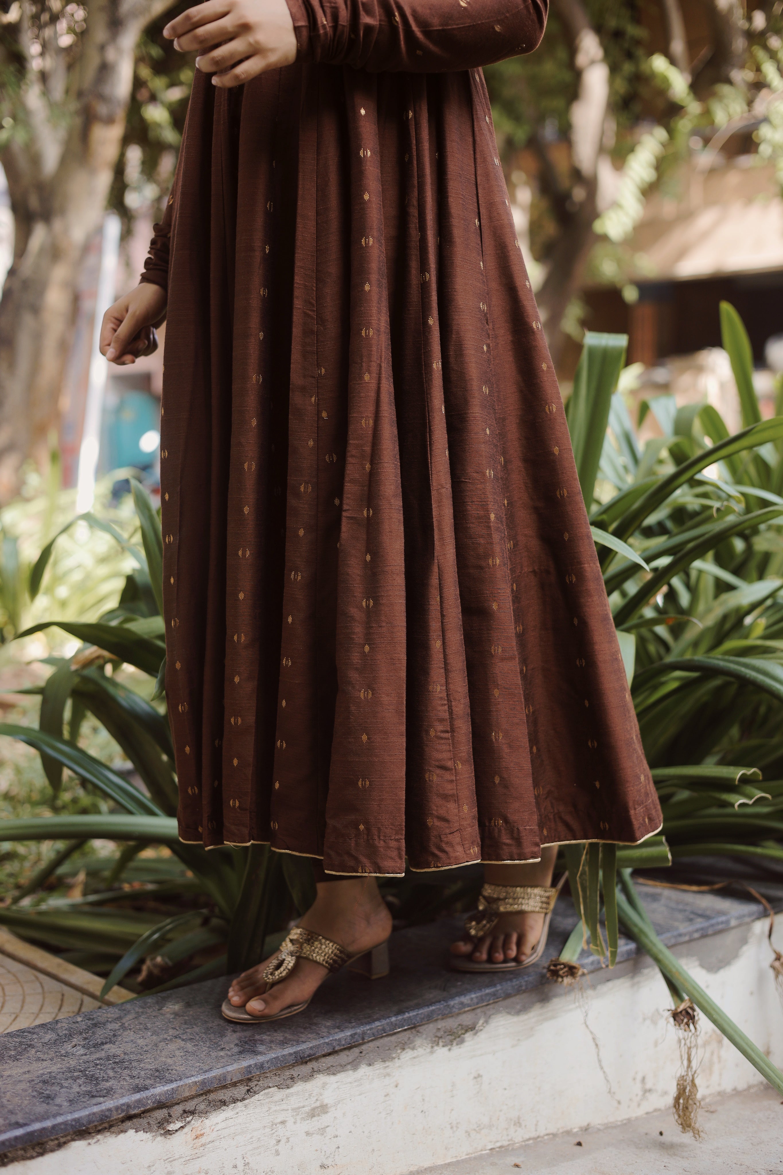 Cultural elegance packed into a flattering single-piece design.