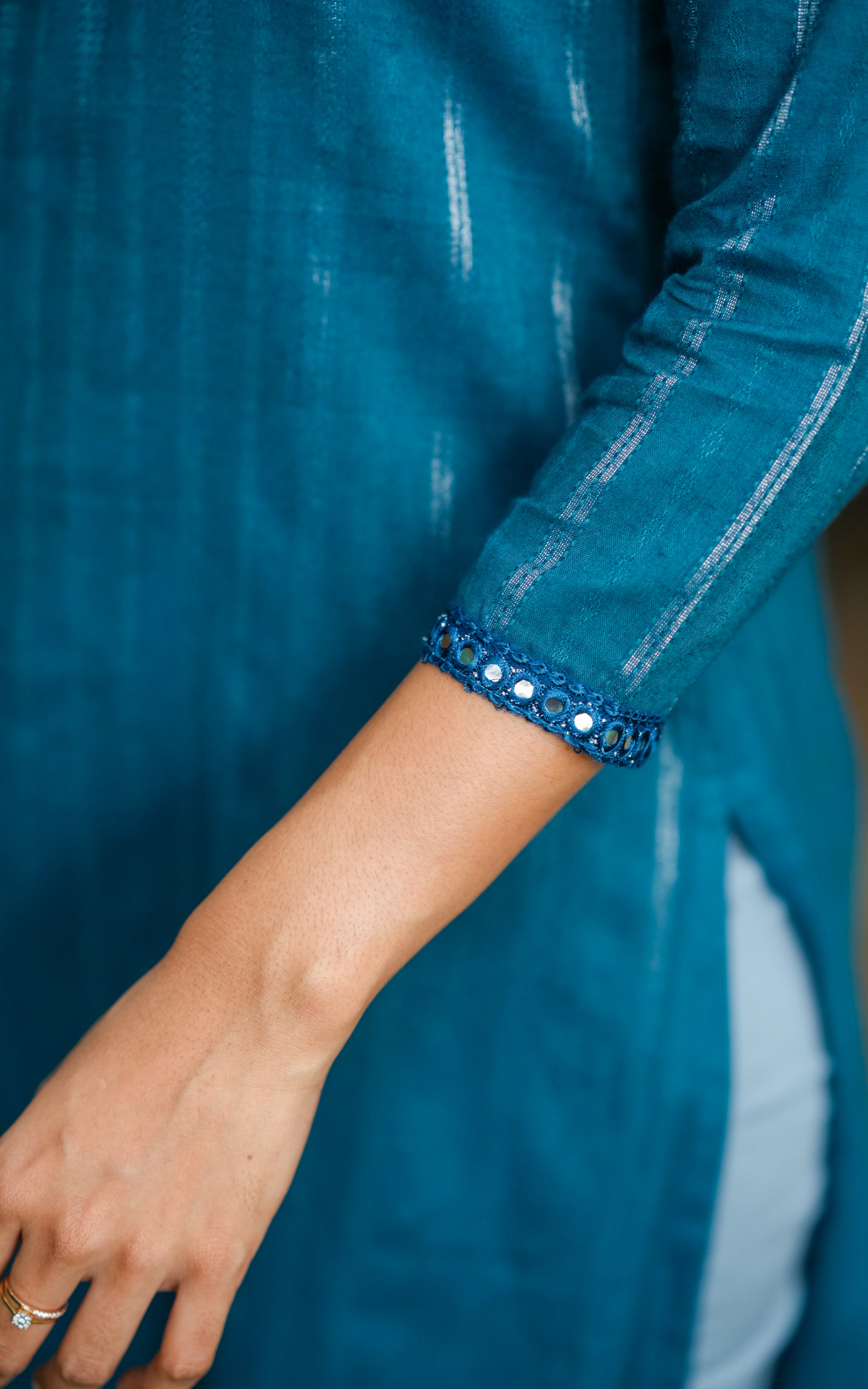 A modern ethnic piece that embraces every curve with confidence and comfort