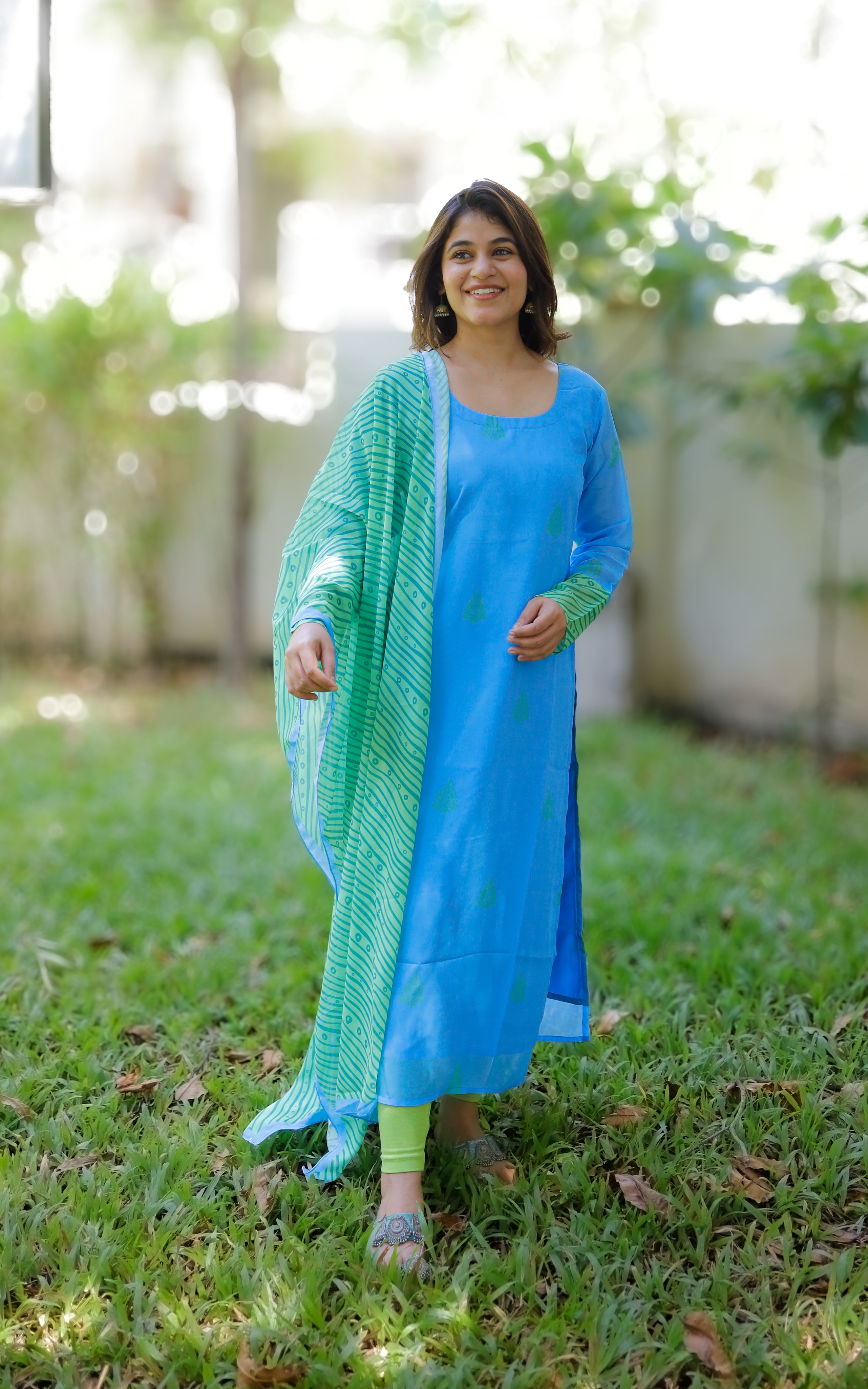 Light blue georgette kurta with subtle green motifs