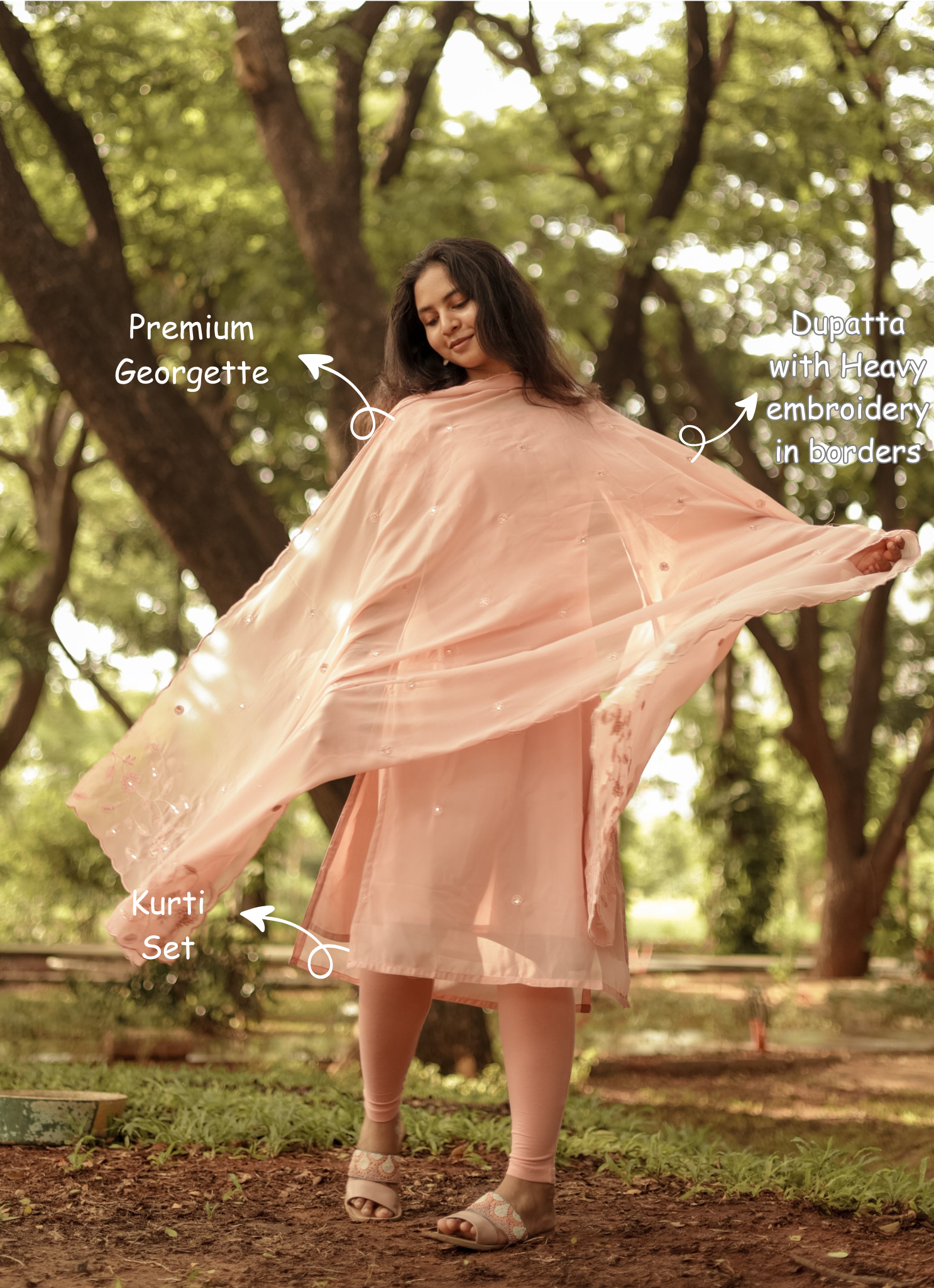Woman wearing a pink kurti set with georgette fabric in a natural setting