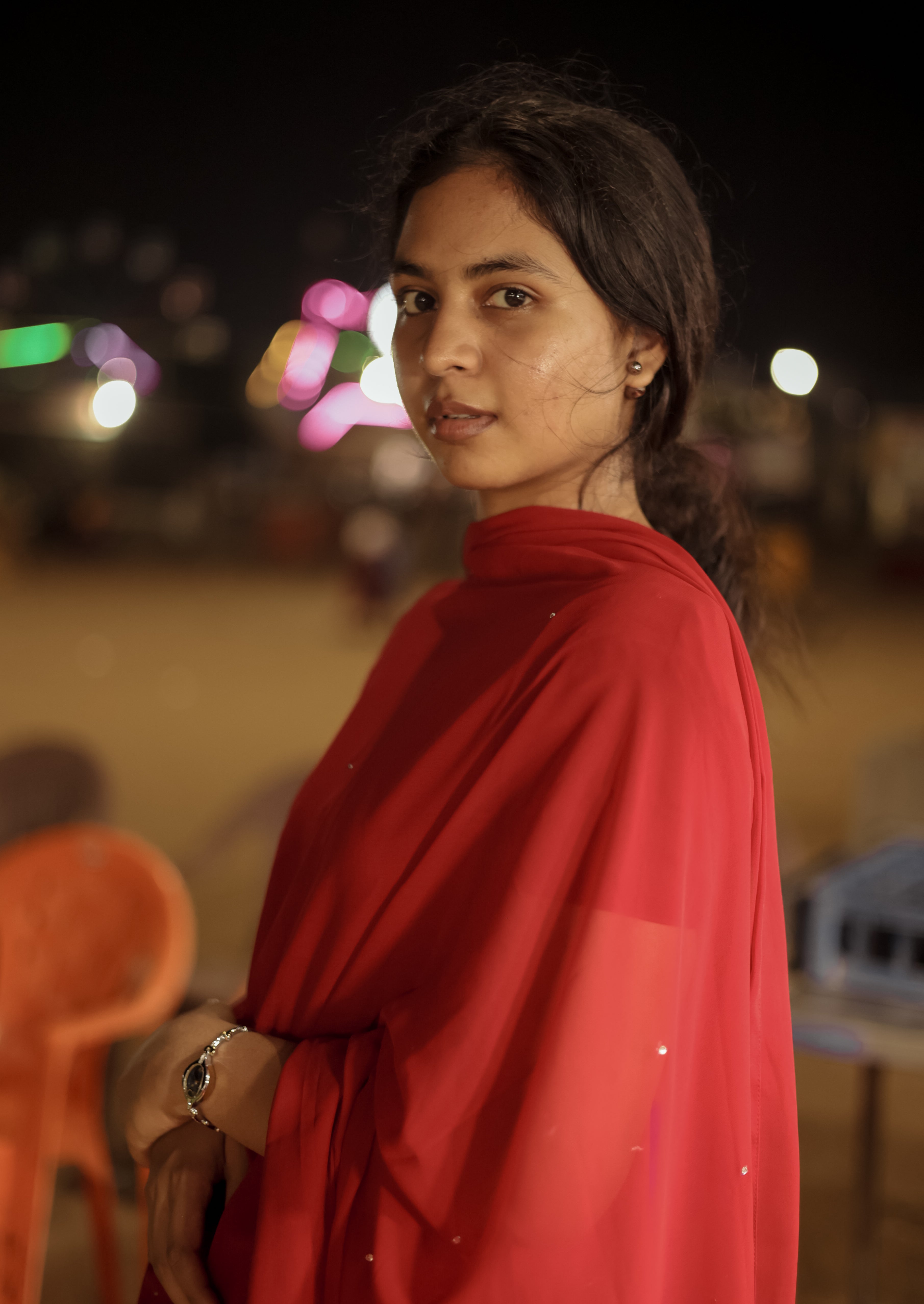 A fashionable red-colored outfit by minnale reena, add a Transparent waist featuring a sleek and trendy design.
