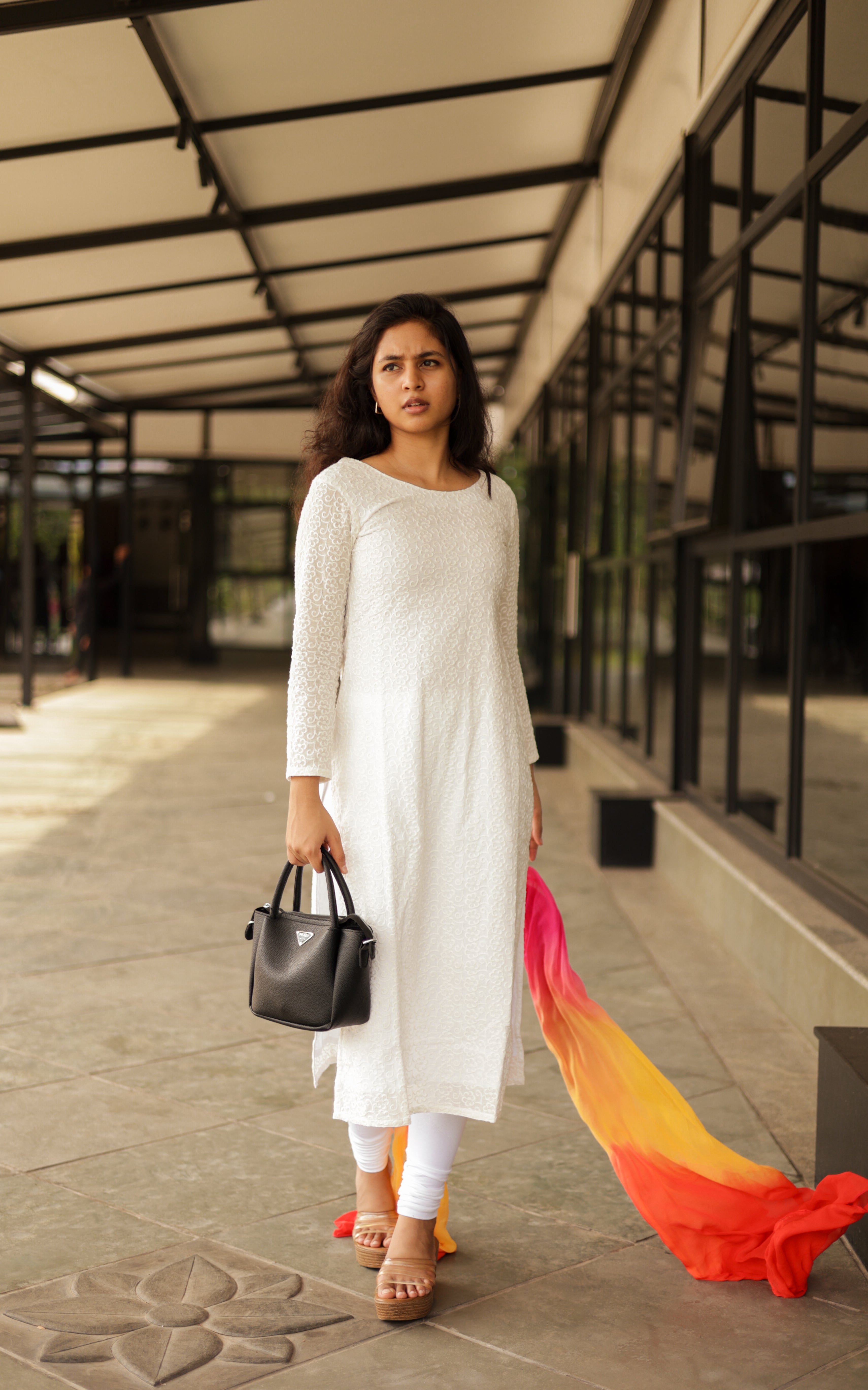 Straight-cut kurti with side slits, offering a graceful and structured drape.
