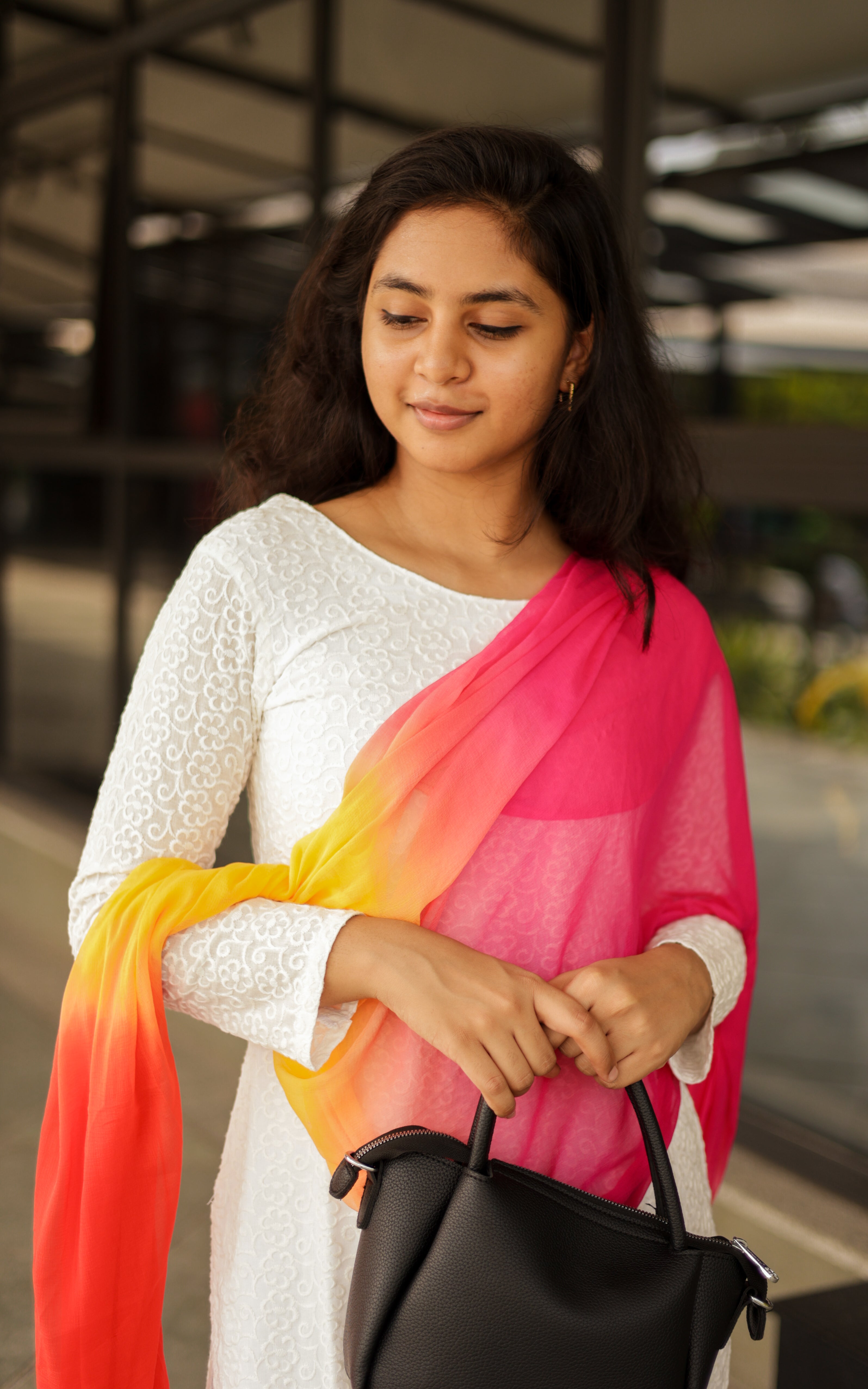 Pure white base with multicolor dupatta—classic and cinematic.