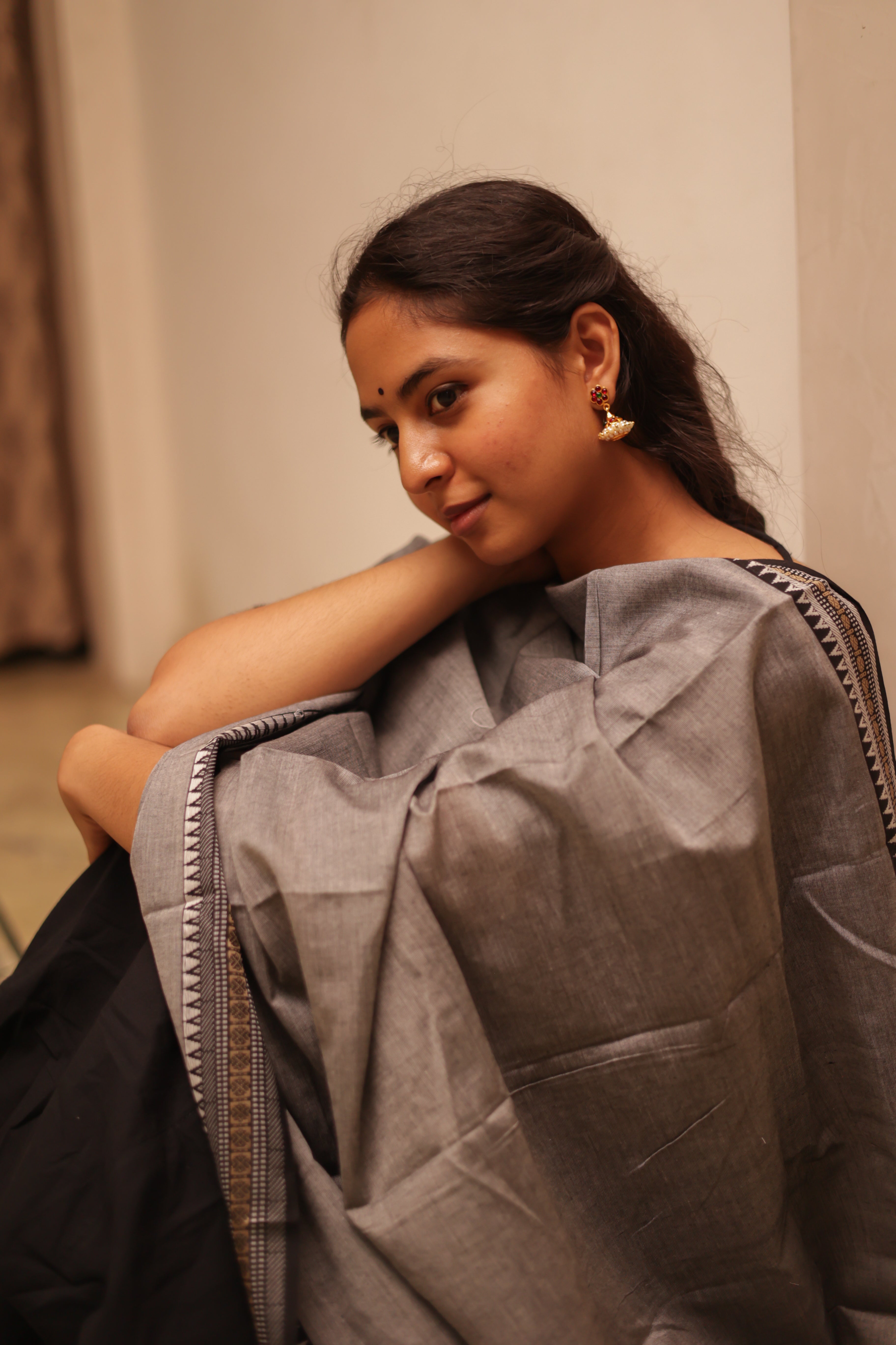 color combination of sandal and brown offers a warm, earthy vibe, making it both elegant and versatile,3/4th sleeves add a balanced touch,outfit includes a handloom cotton dupatta,enhanced with back knots, adding a modern, trendy look