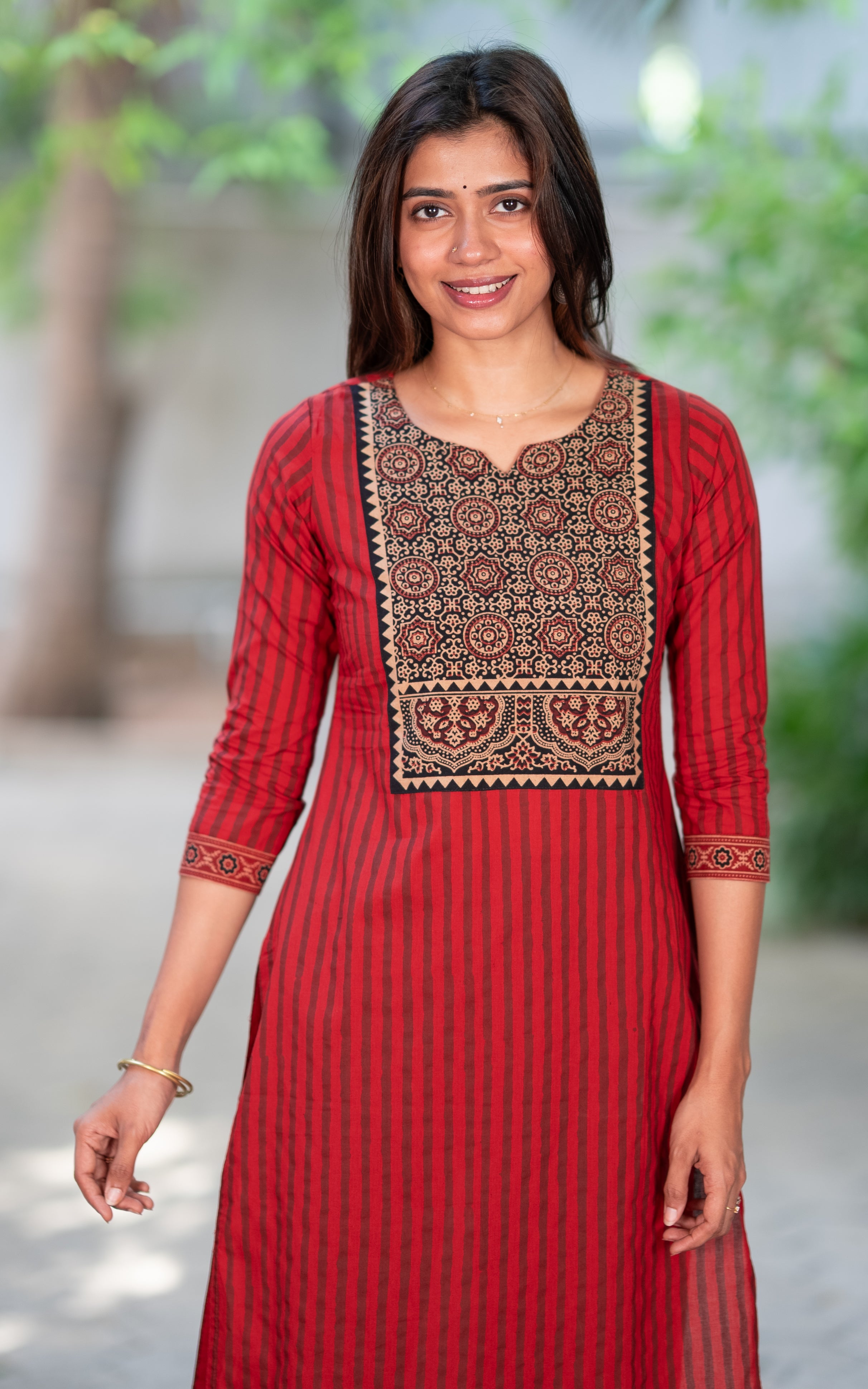 Thalir Maroon