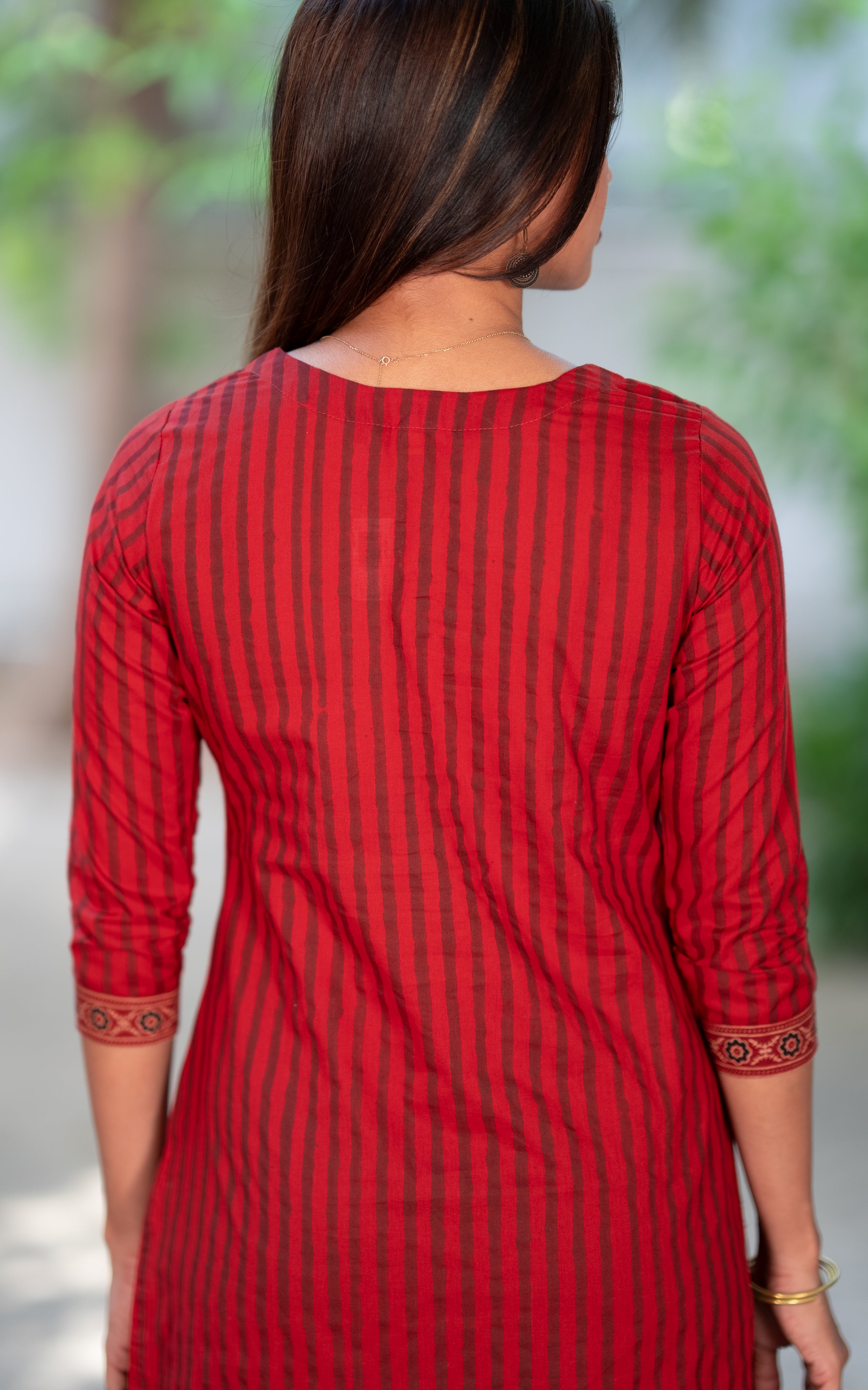 Thalir Maroon