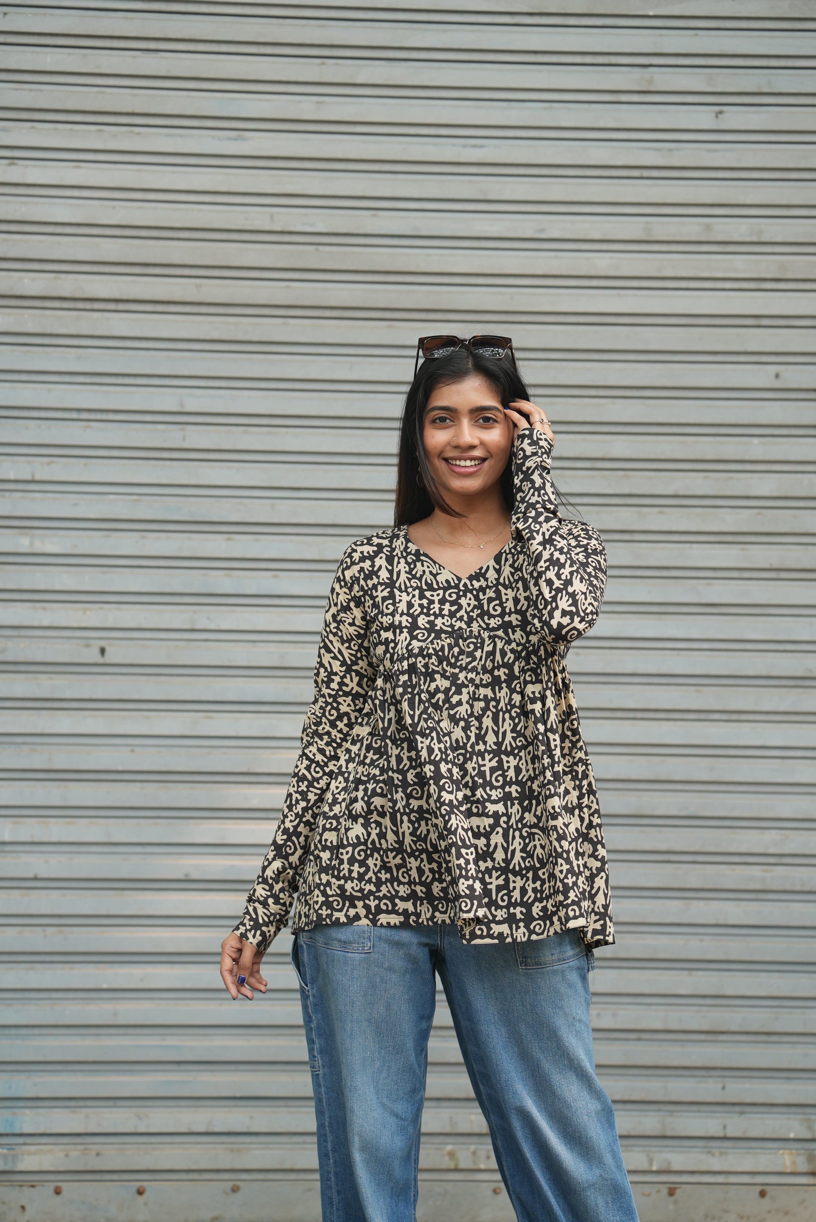 Trendy college wear outfit.
Smart casual office wear top.