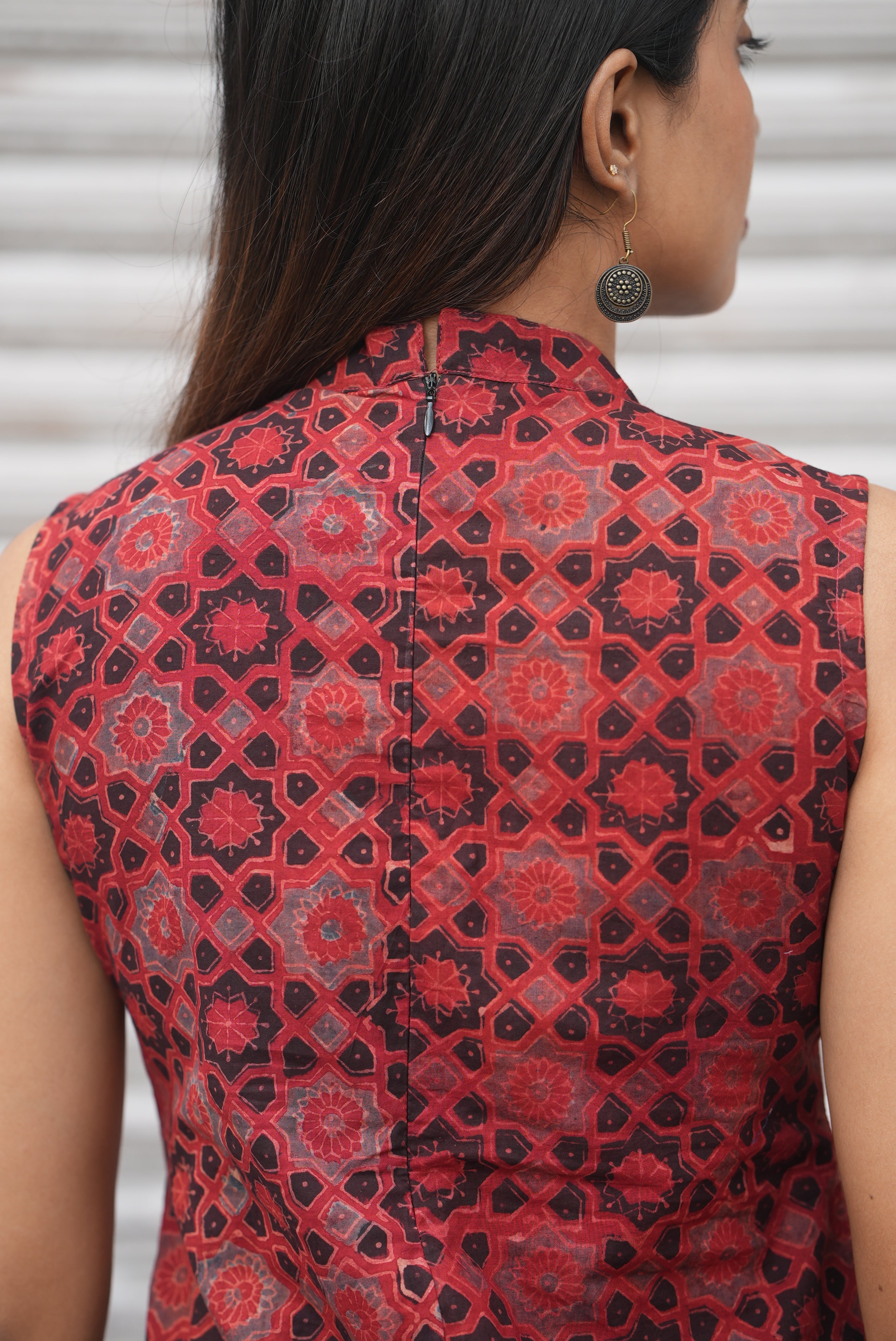 Back zipper for perfect fit.
Traditional hand block print pattern.