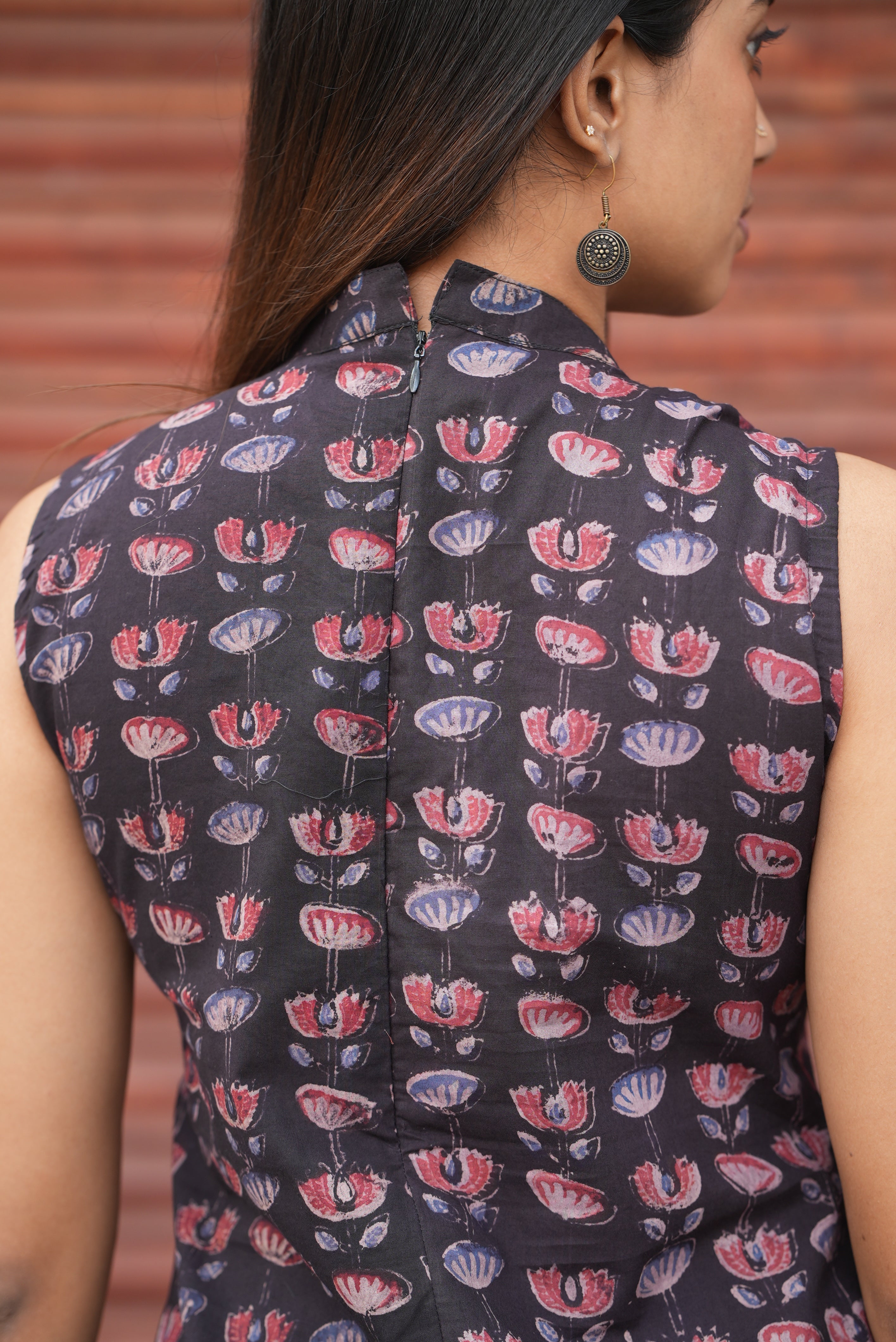Back zipper for perfect fit.