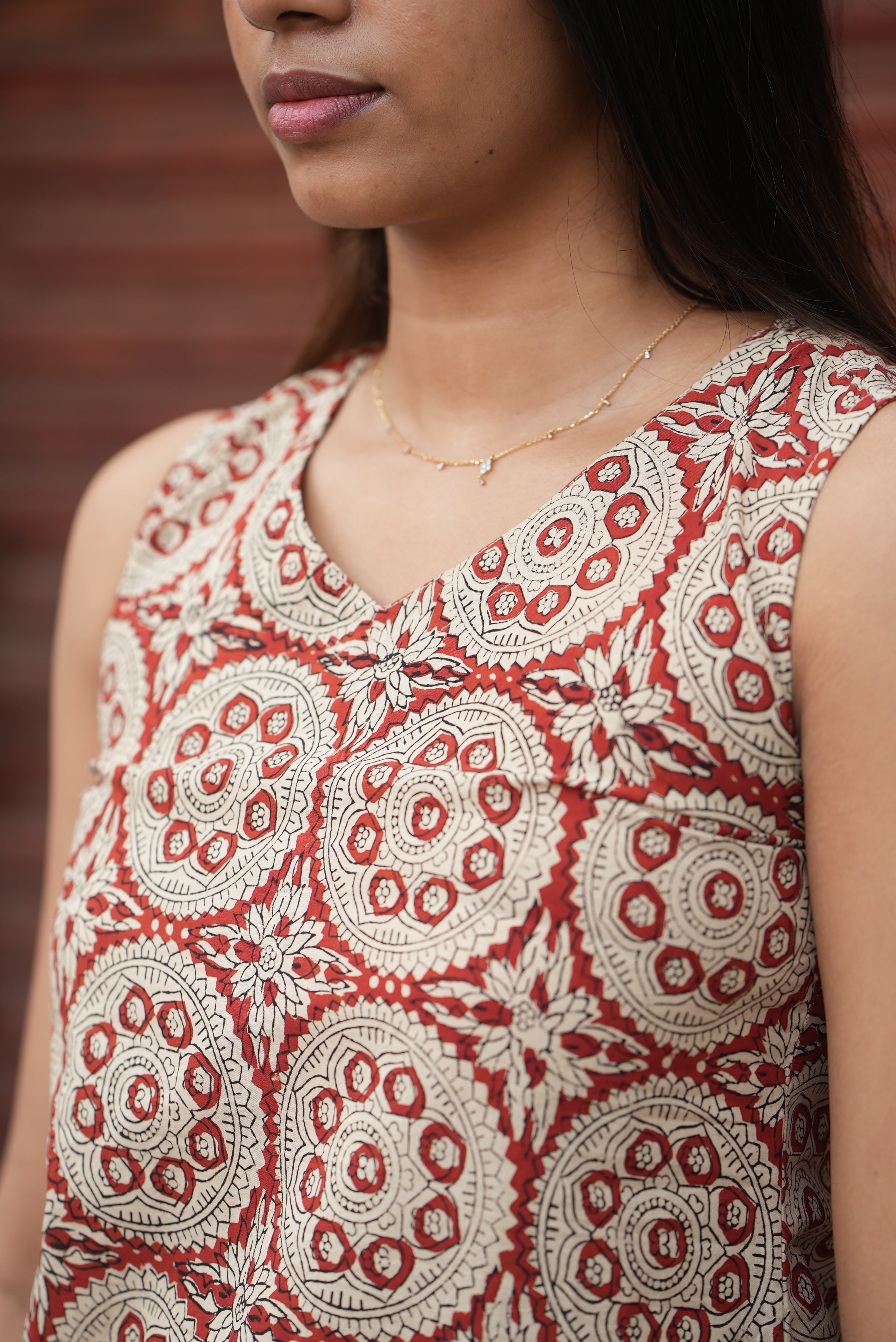 Stylish maroon hand block printed cotton short kurti for women.