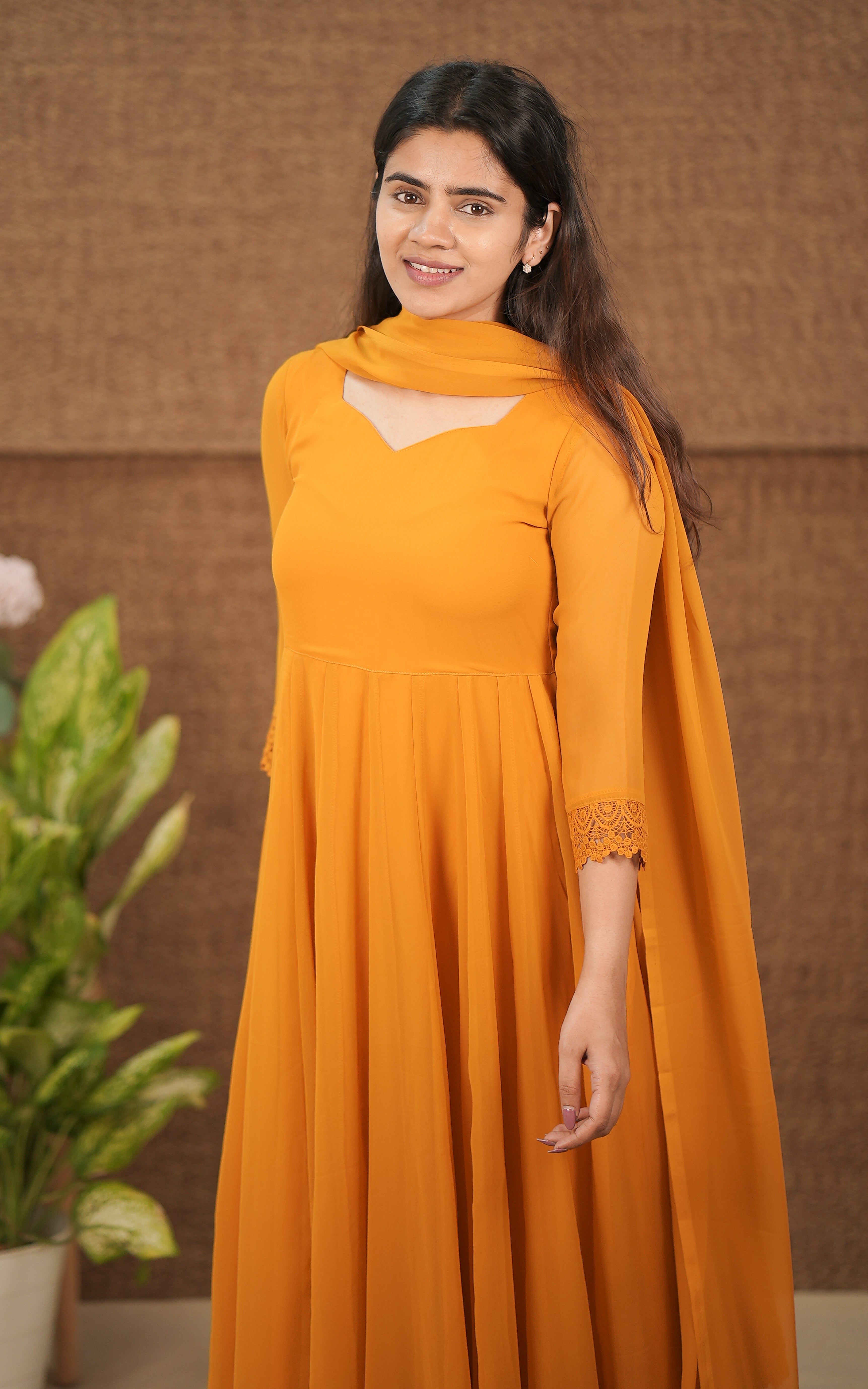 instore office wear for women georgette with butter crepe lining full flared anarkali with crochet lace border color: mustard