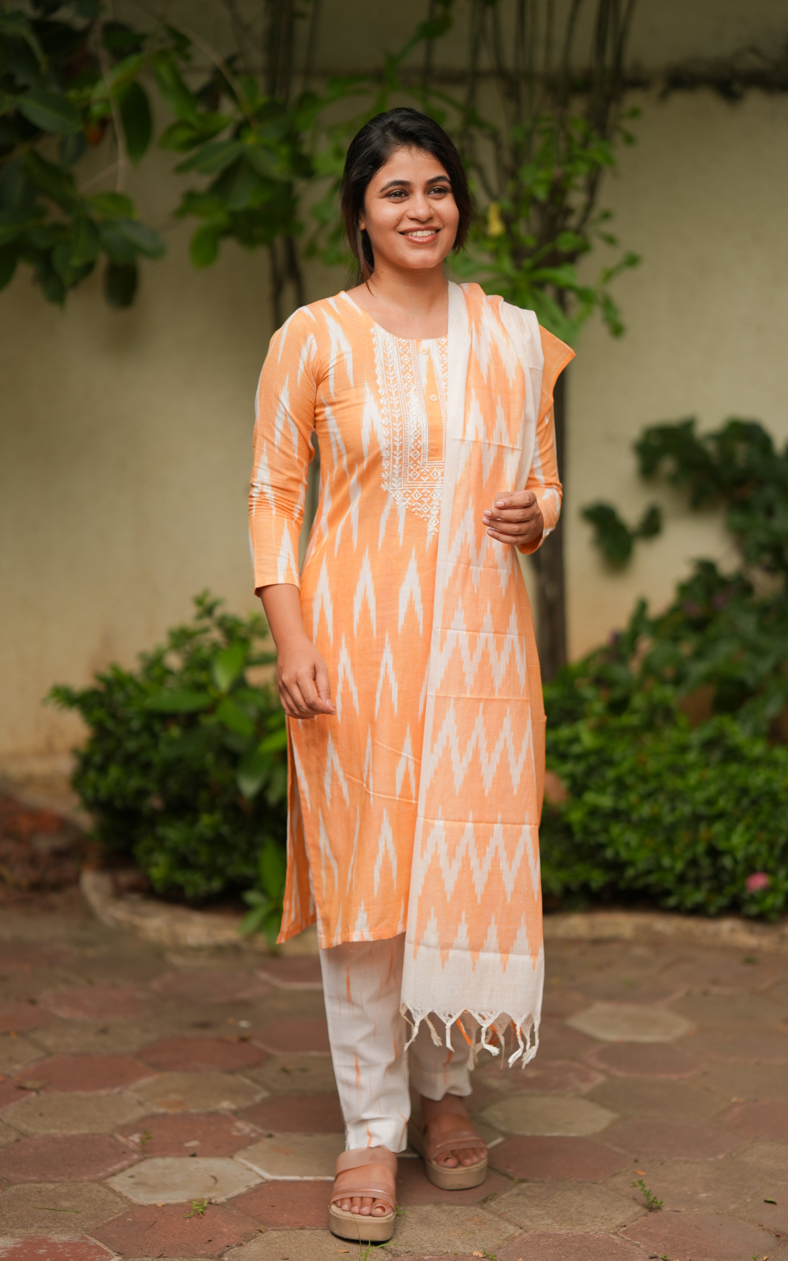 orange color kurti set 