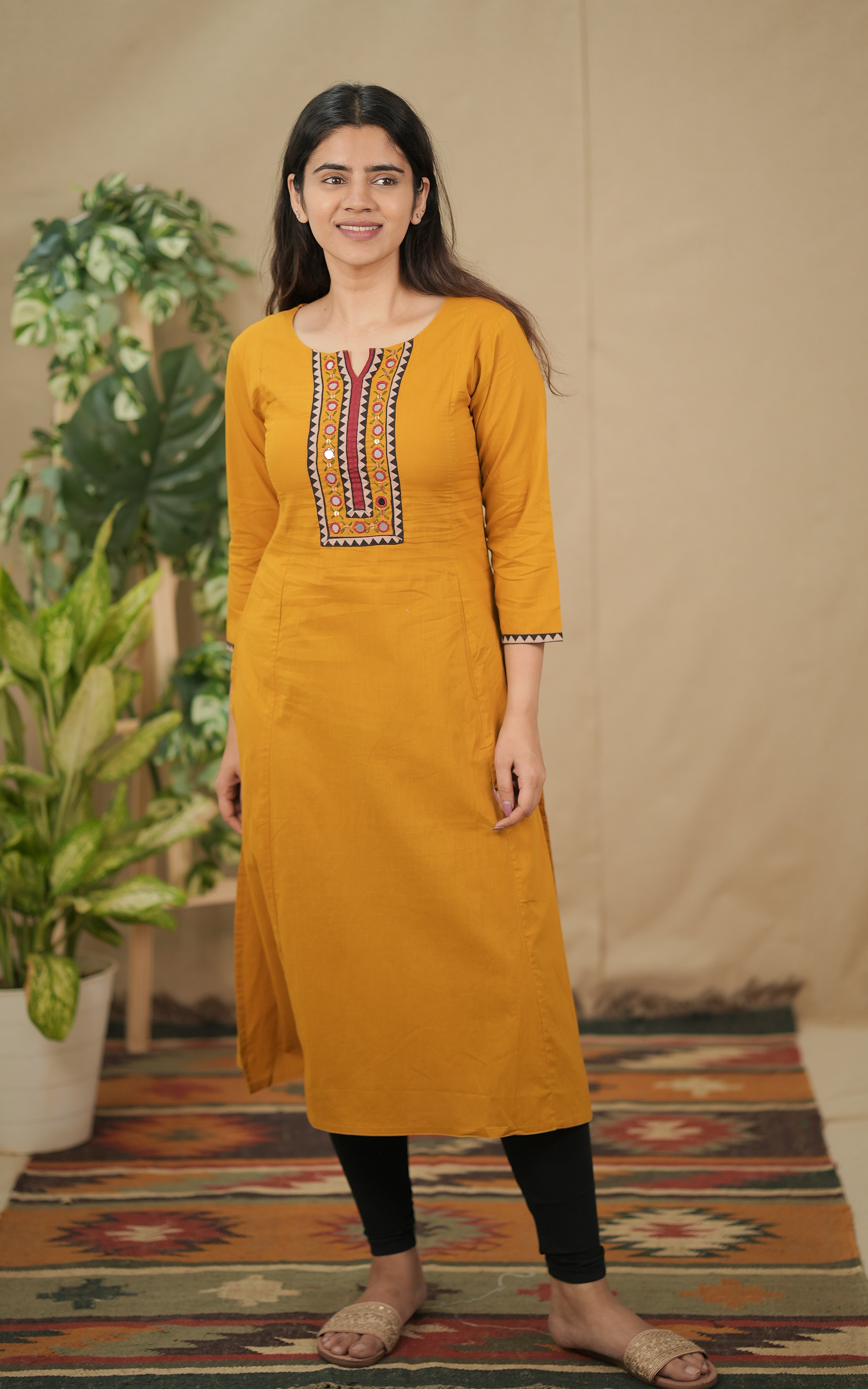 in store mohini cotton aline kurti with side slit and mirror work in front yoke color: mustard 