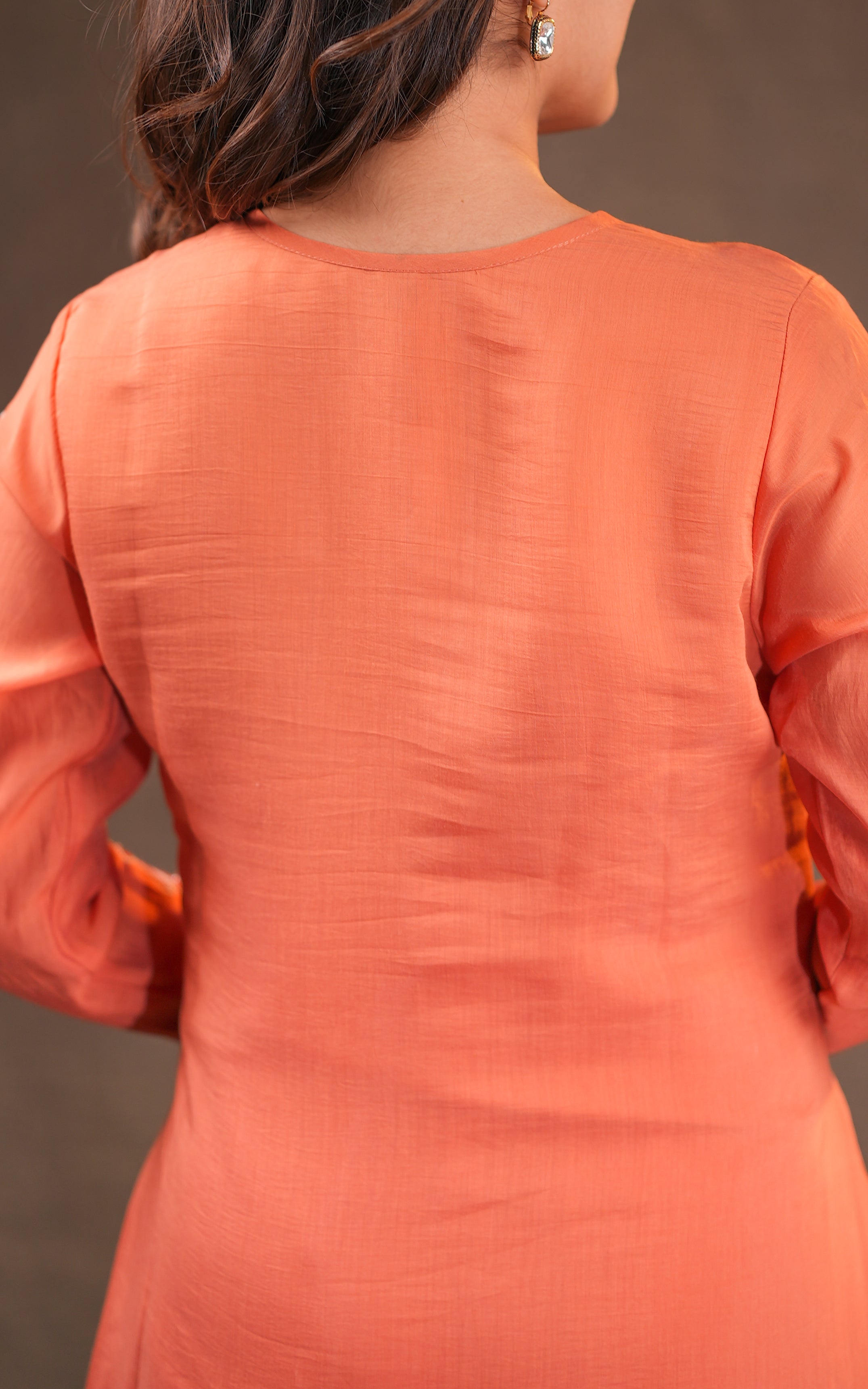 Orange color kurti sets