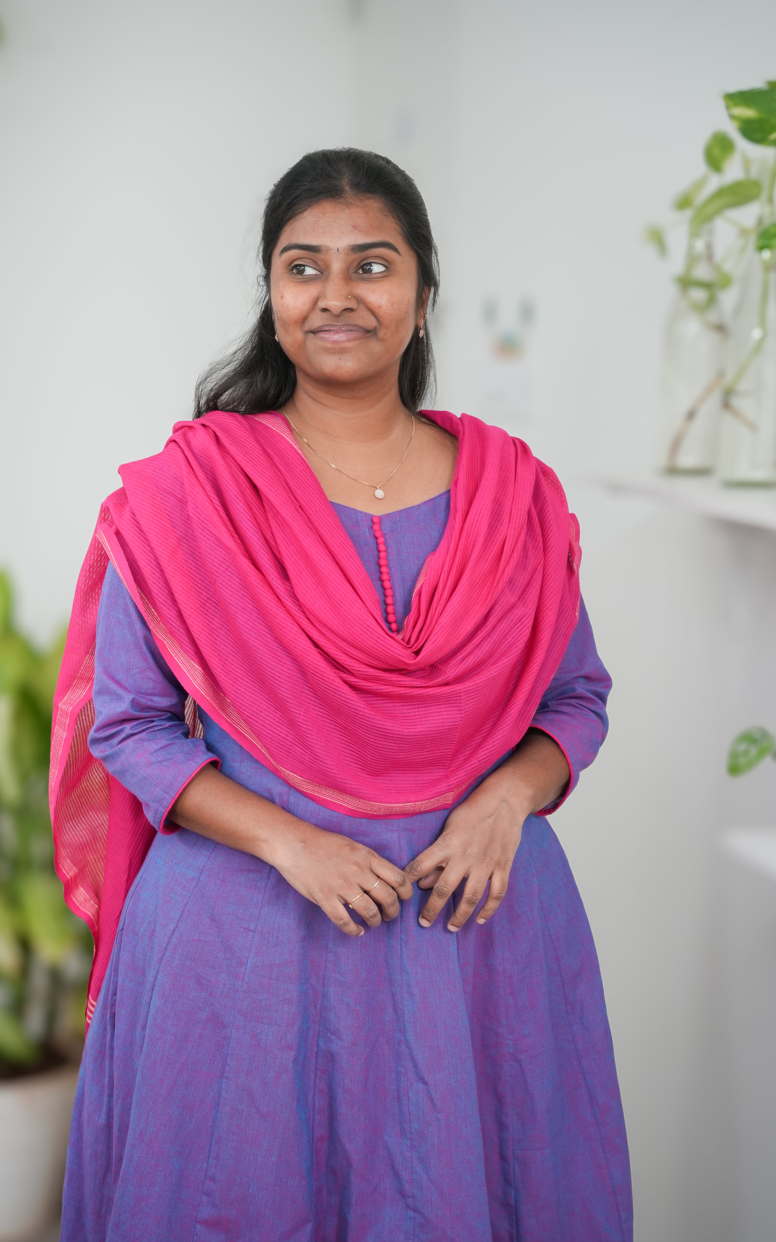 A-line kurti in rich purple South Cotton, complemented by a soft pink dupatta with subtle borders, perfect for festive and casual occasions