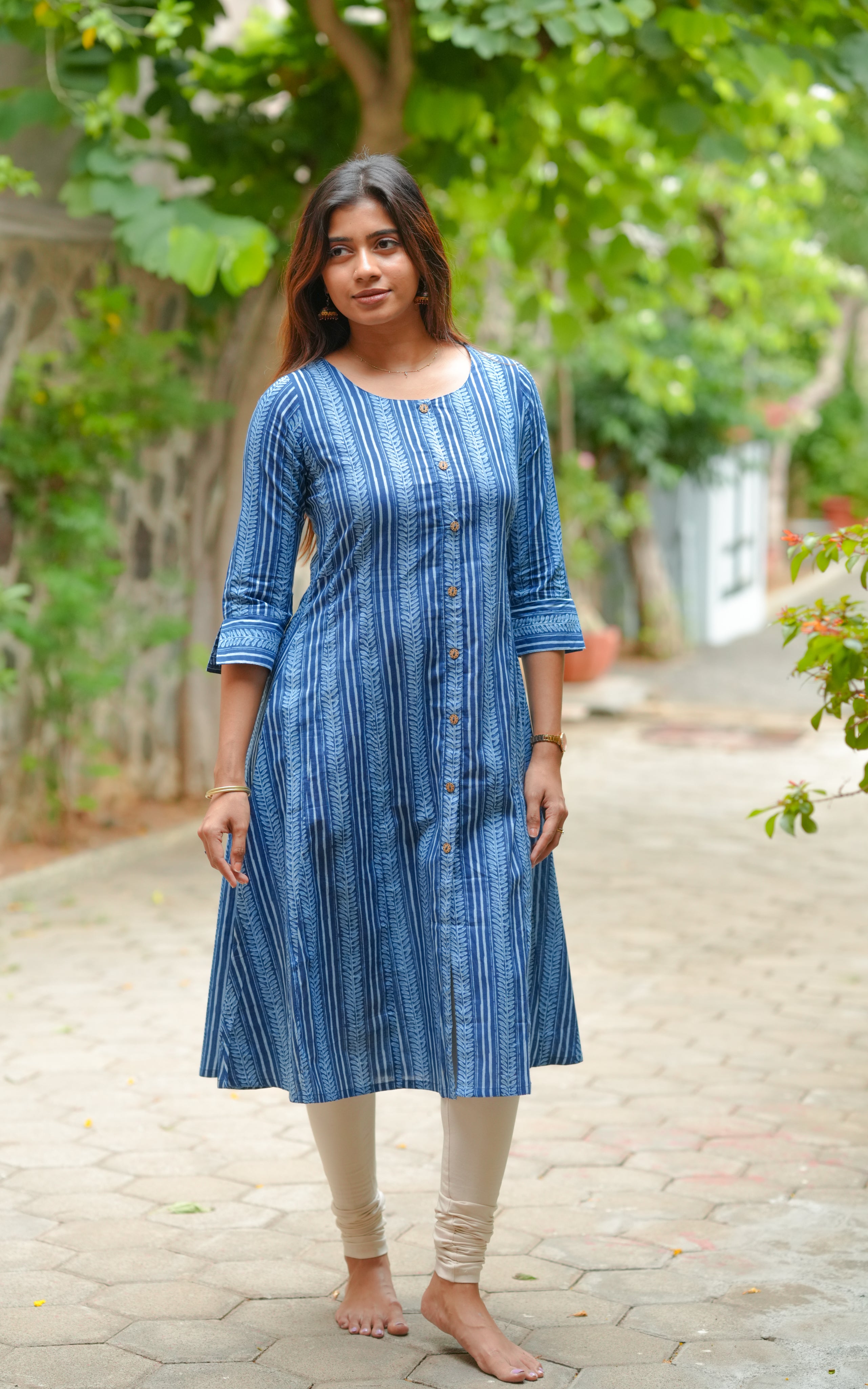 The kurti is made from indigo-dyed cotton fabric.