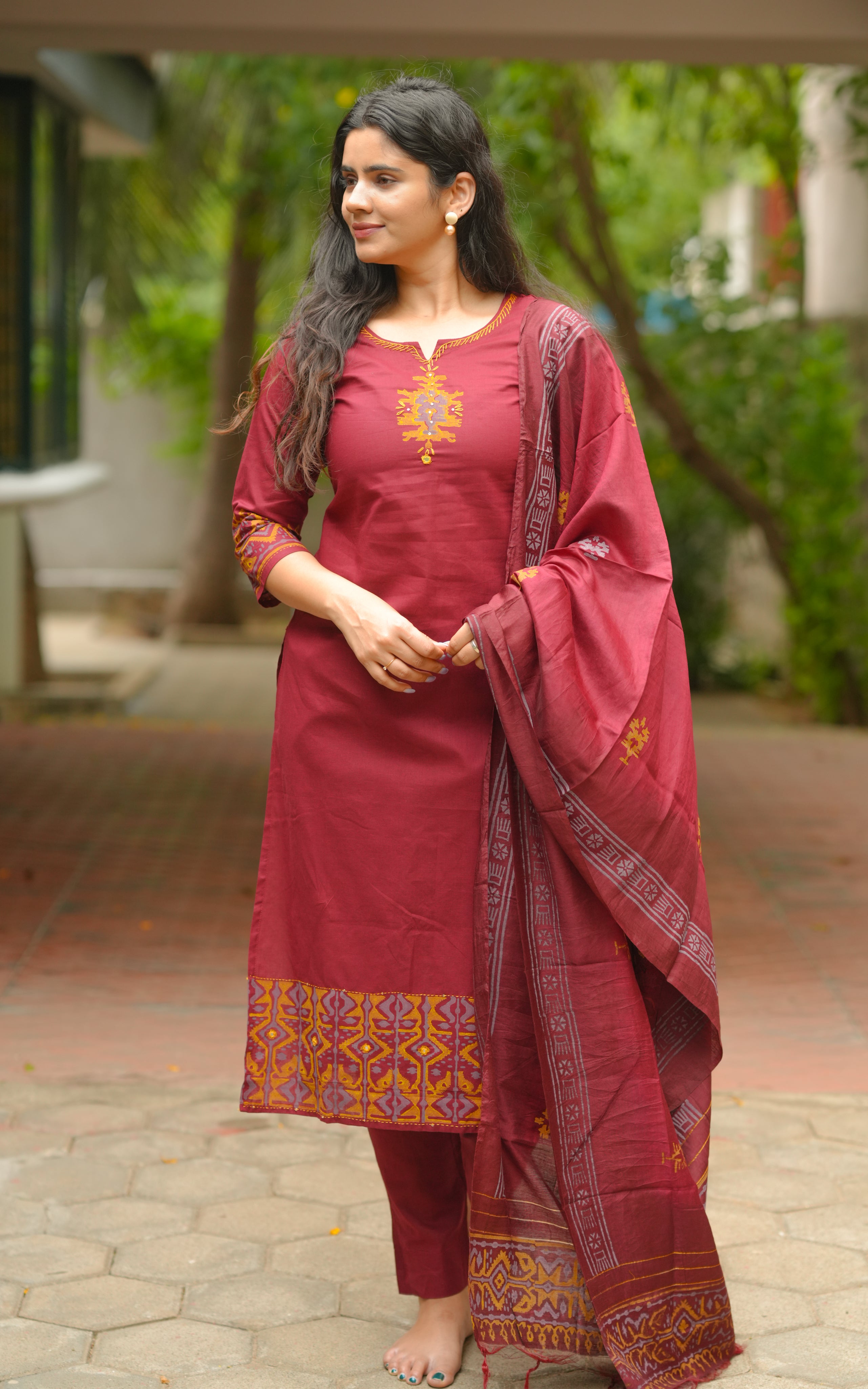 Straight cut kurti with comfortable side slits for easy movement.