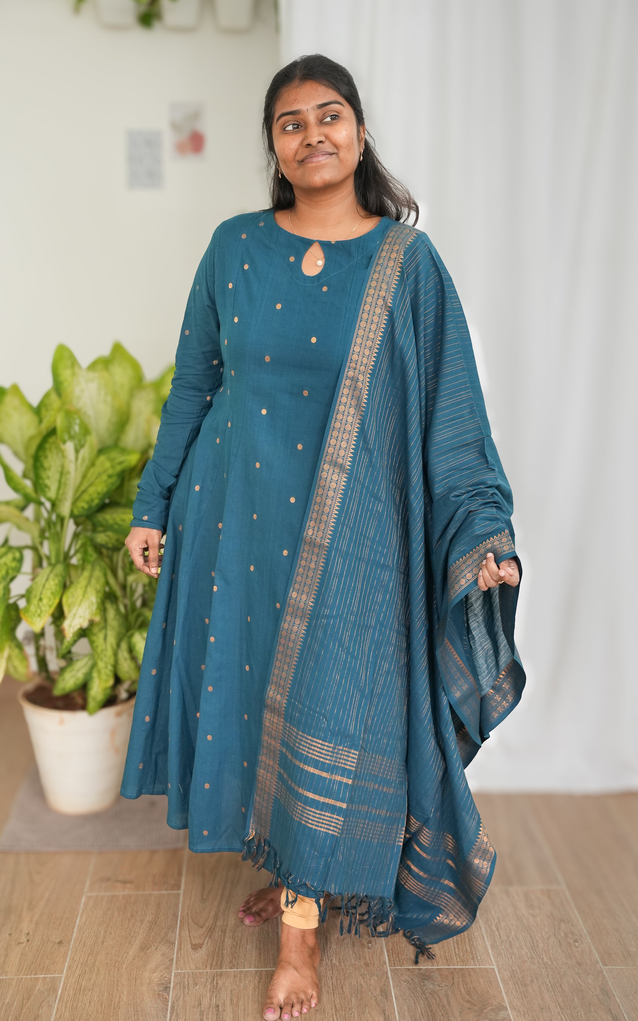The outfit is crafted from soft and breathable cotton fabric 