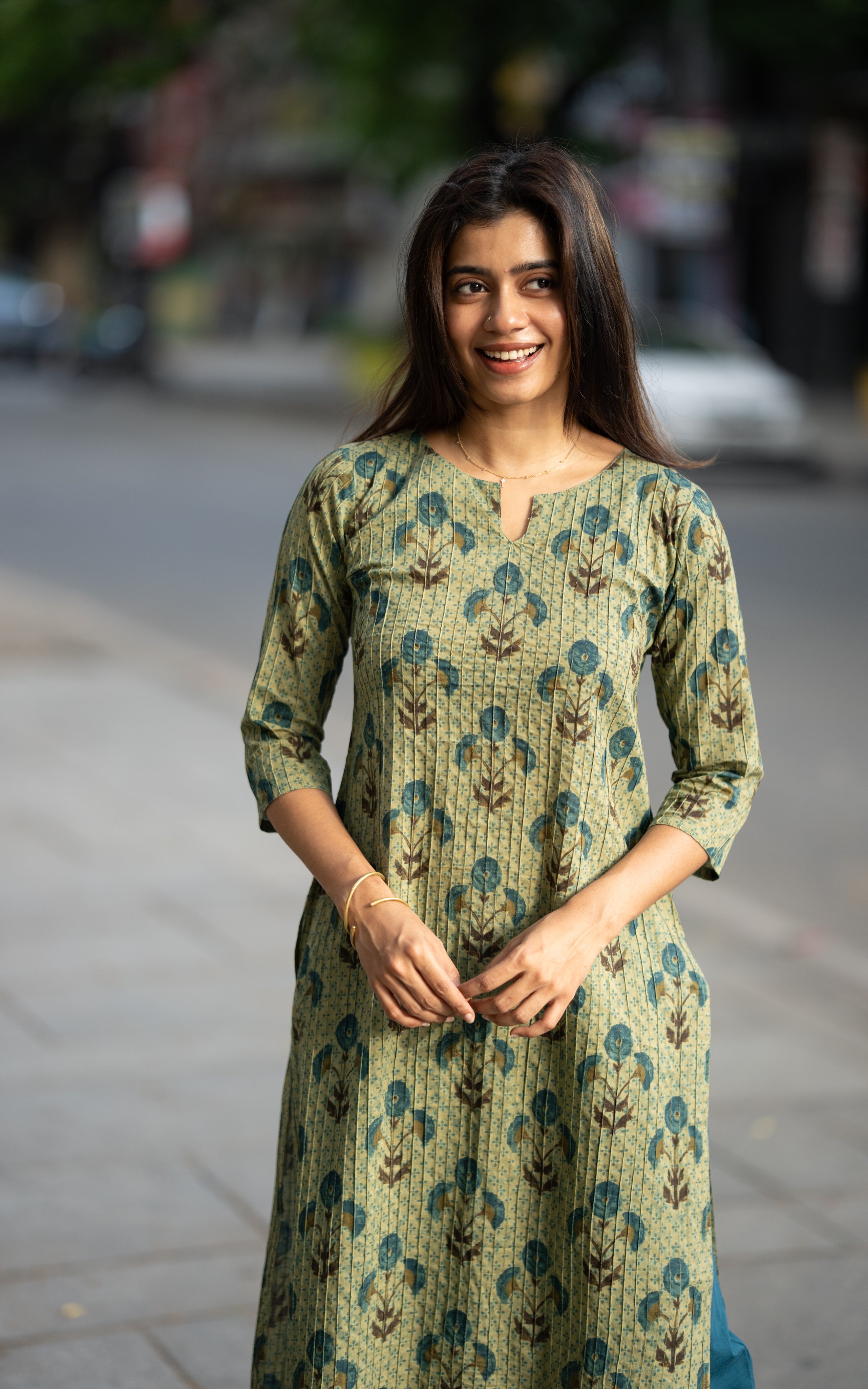 Nisha A