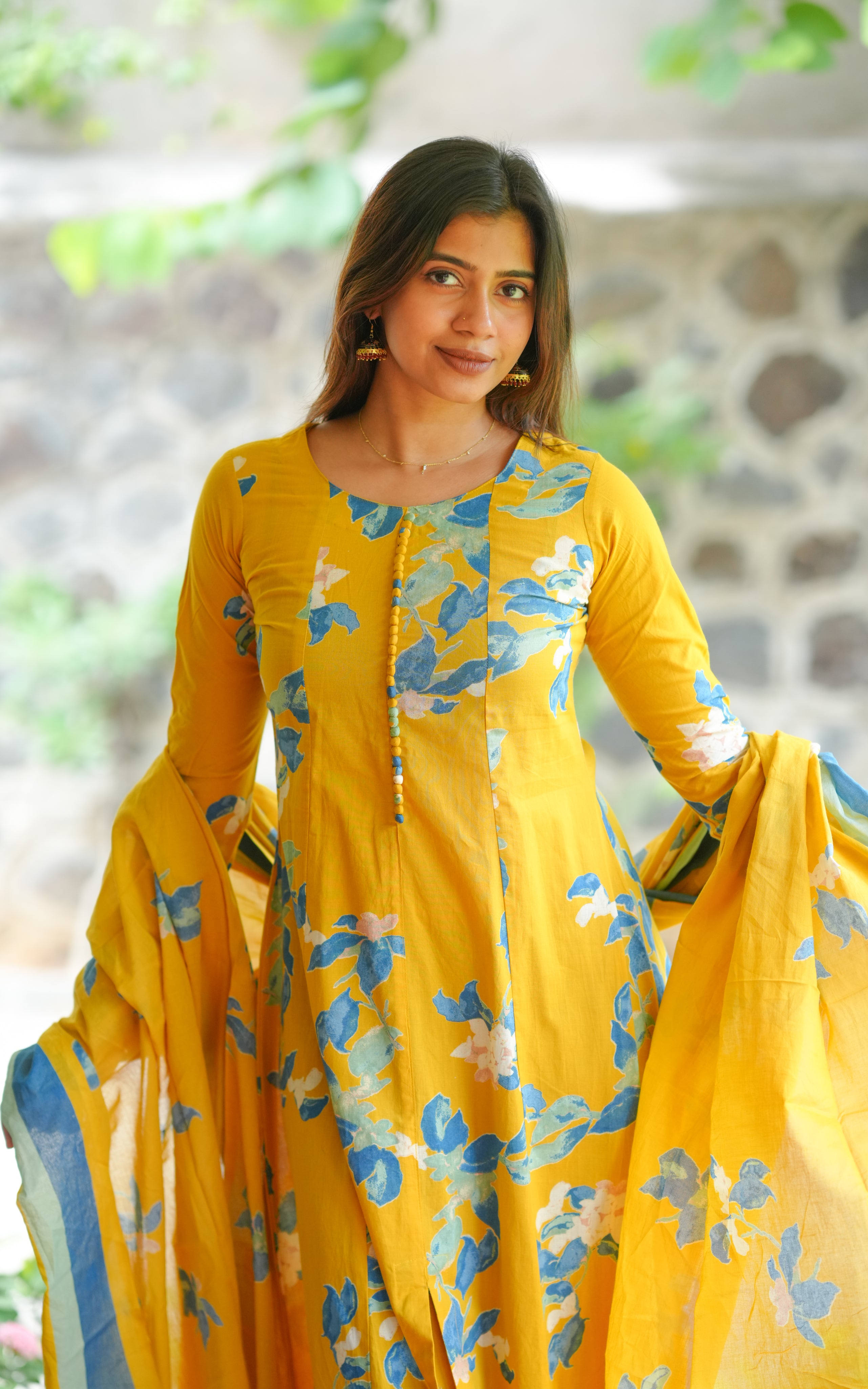 The kurti has a front slit and gathered sleeves, adding a stylish touch.