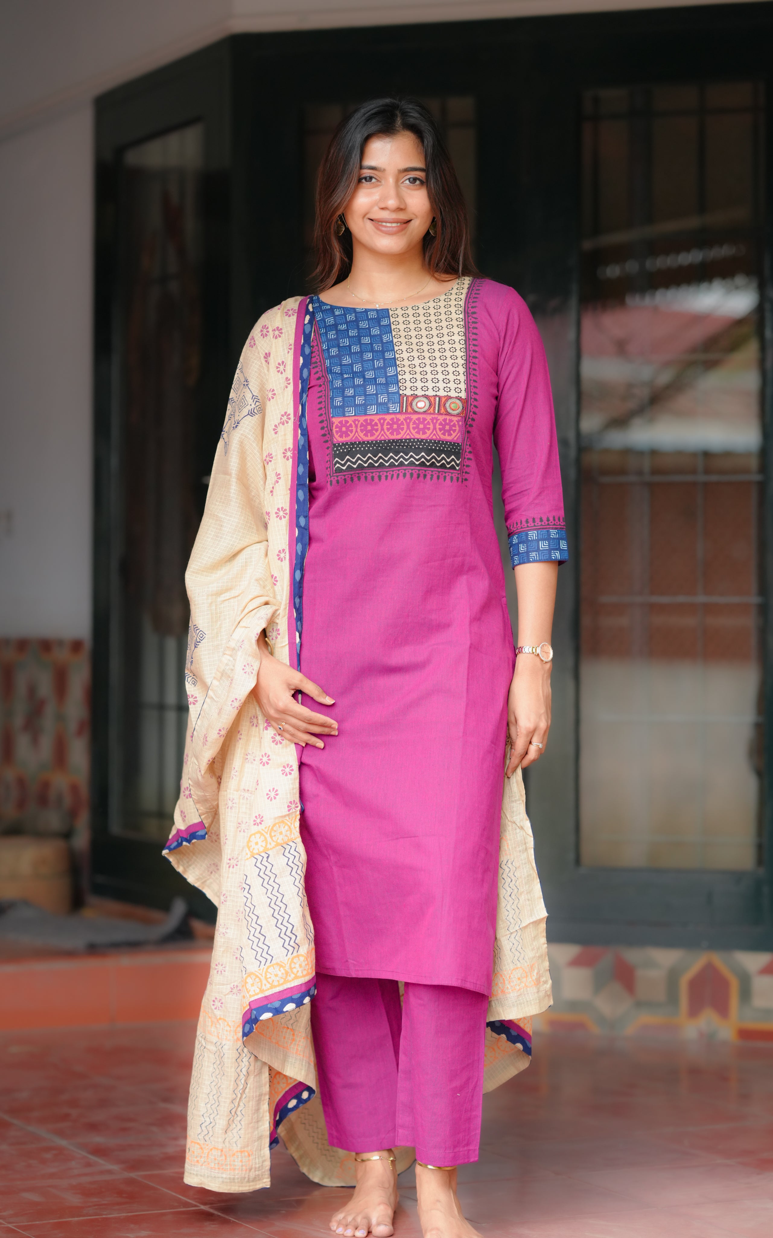 The kurti features a unique hand-block printed yoke with geometric and traditional patterns.