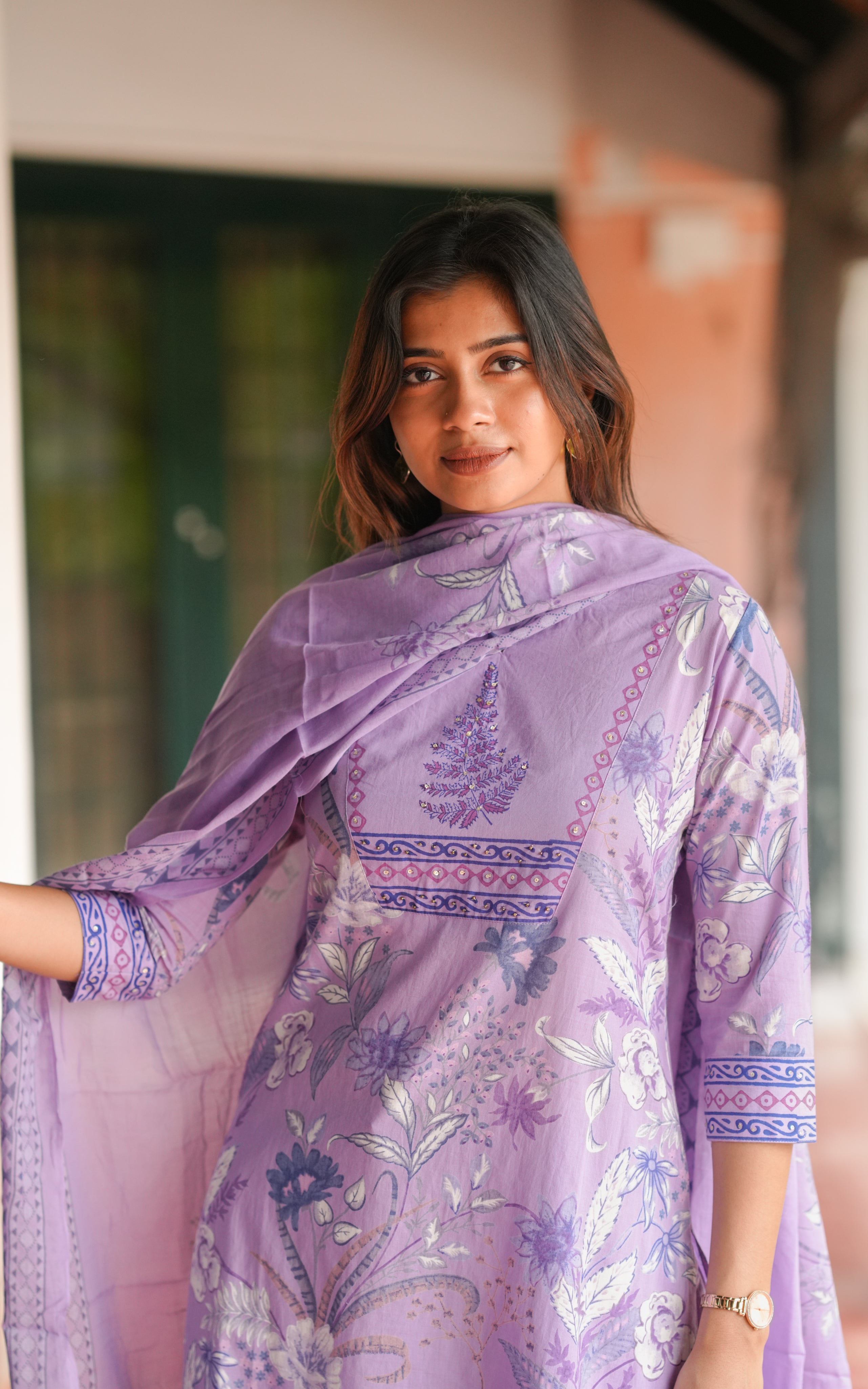It features a straight cut kurti with stylish side slits.