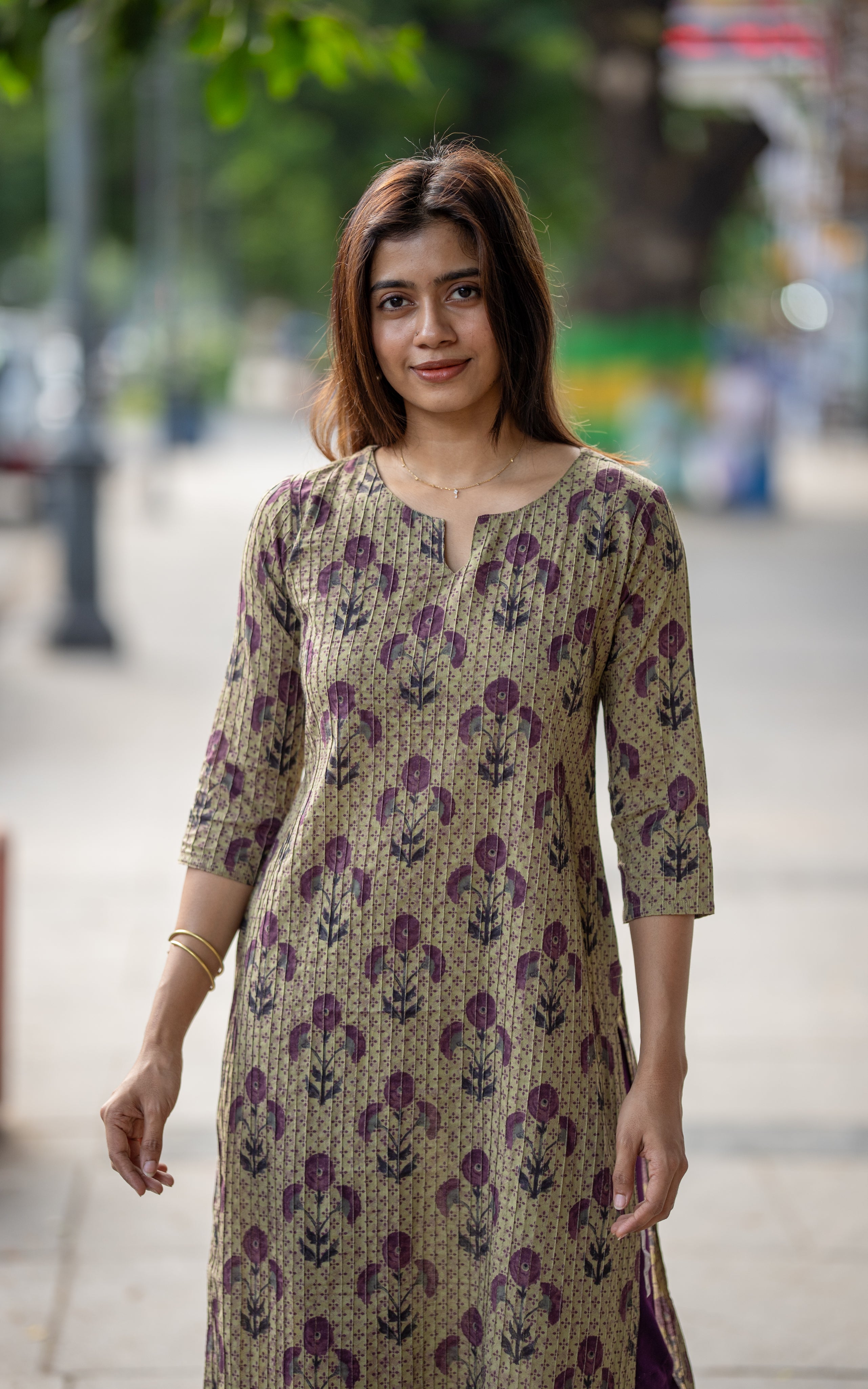Nisha B