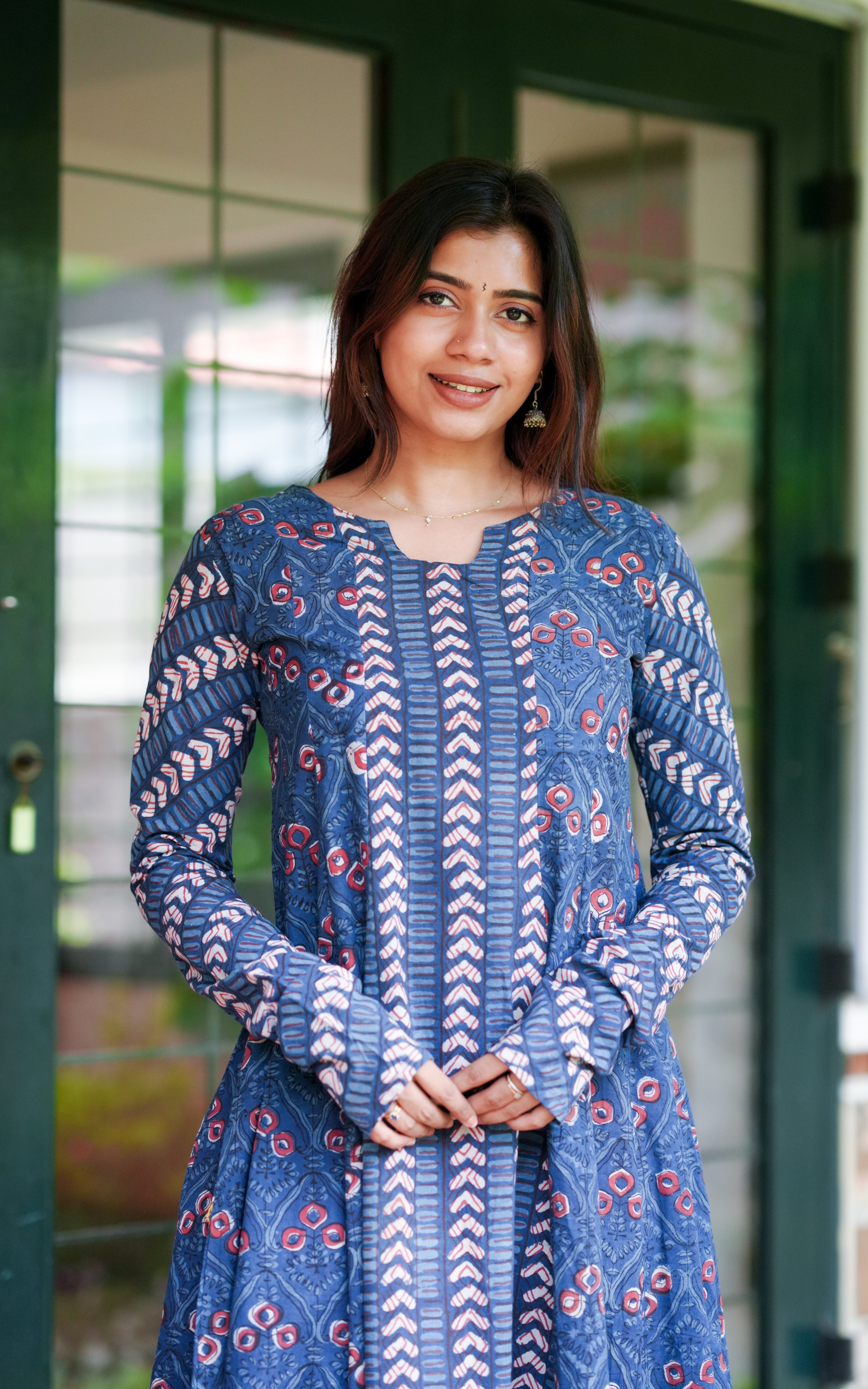 The kurti features a traditional gathered sleeve design.