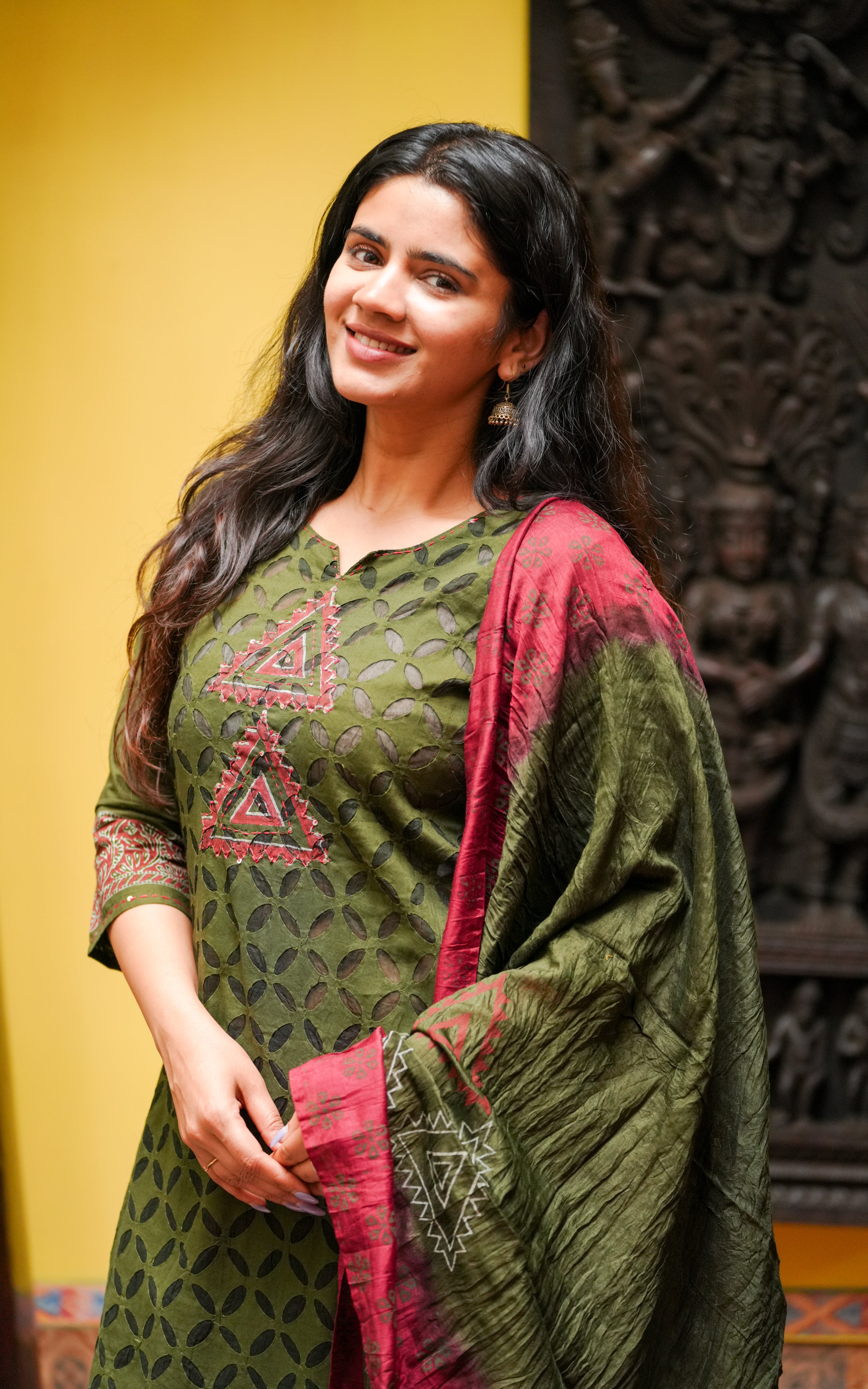 Applique work straight cut kurti with side slit, crafted from breathable cotton.