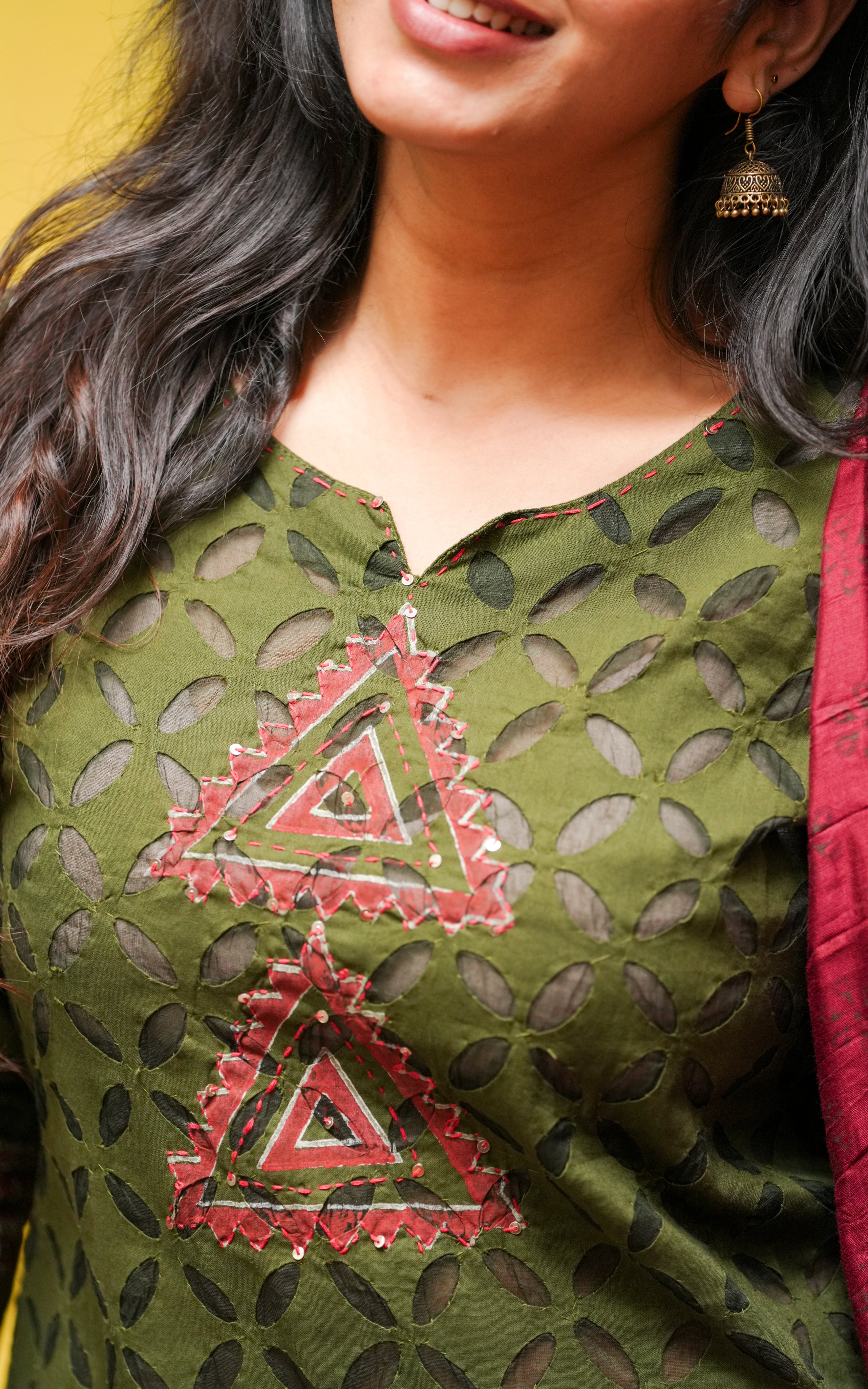 Paired with matching cotton pants featuring a full elastic waistband and one side pocket.