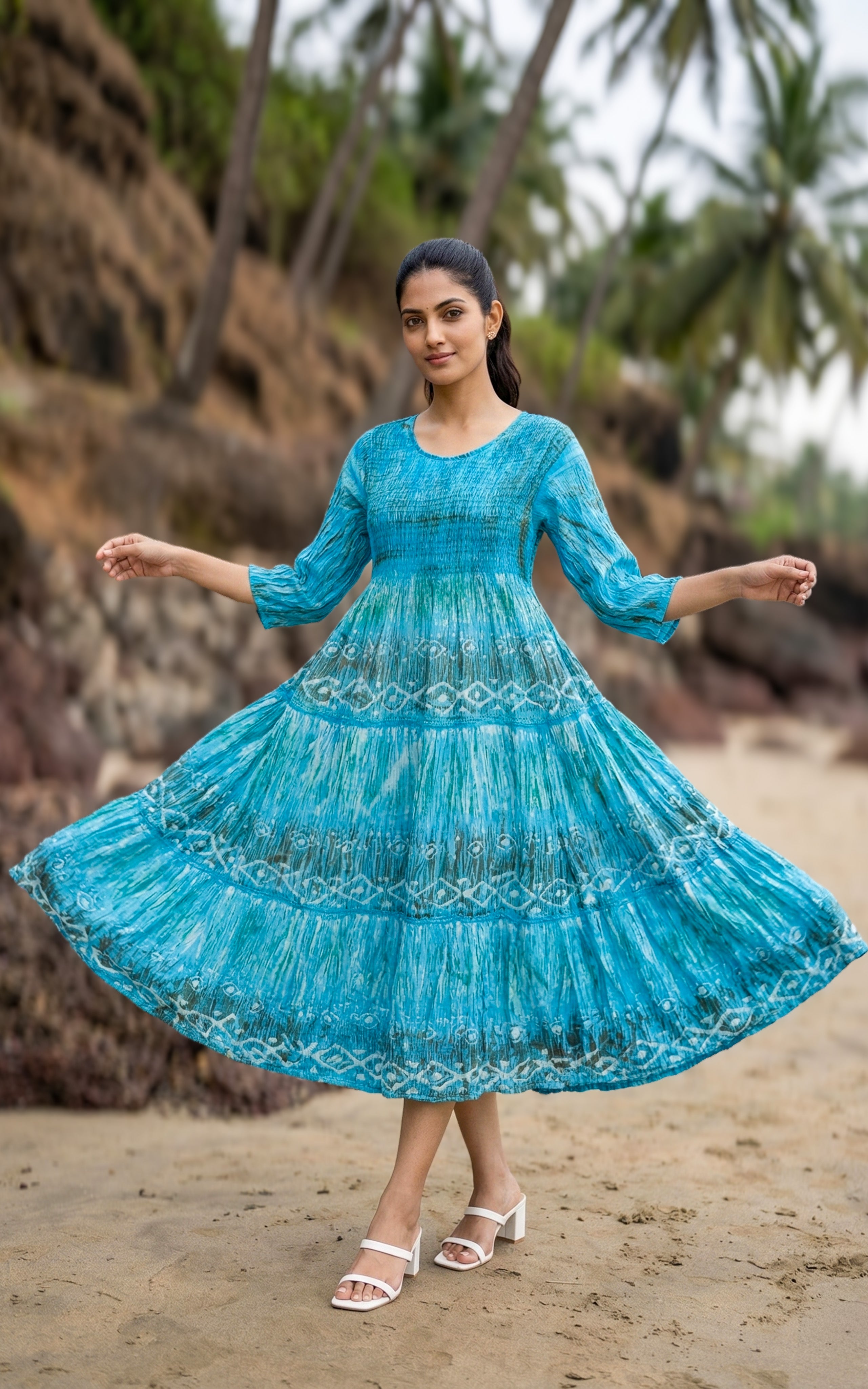 Sky Blue smocked Indo Western maxi dress made from viscose fabric.
