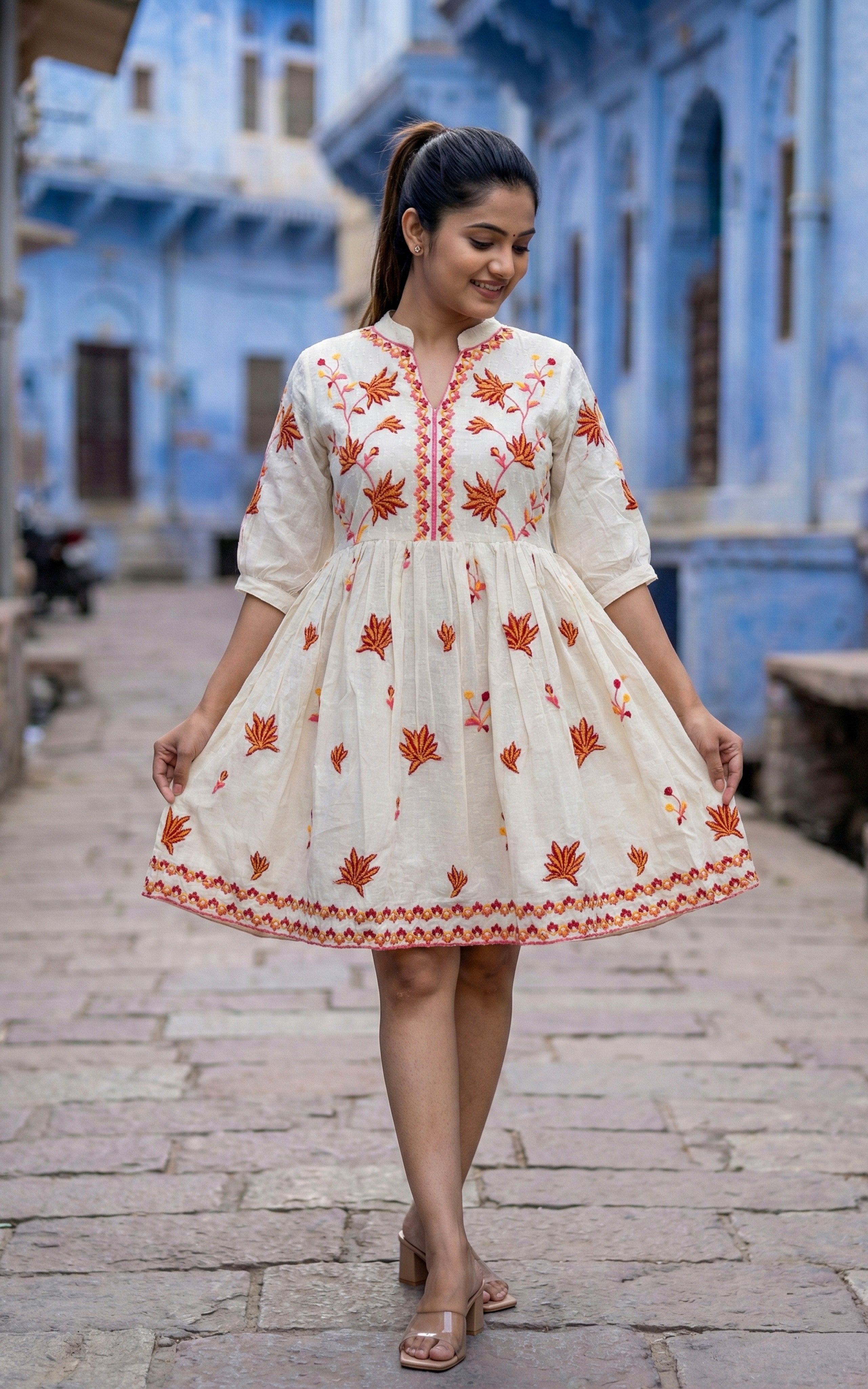  Floral Embroidered Peplum Top