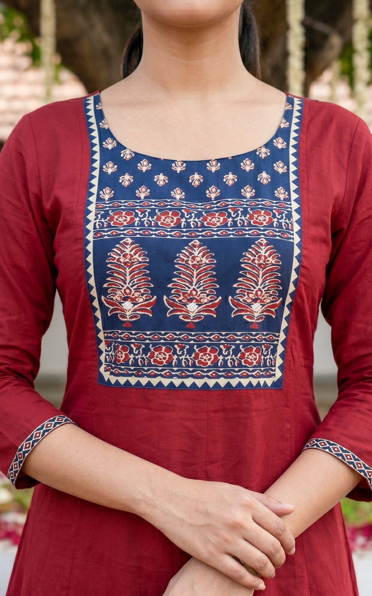 Renuka Maroon