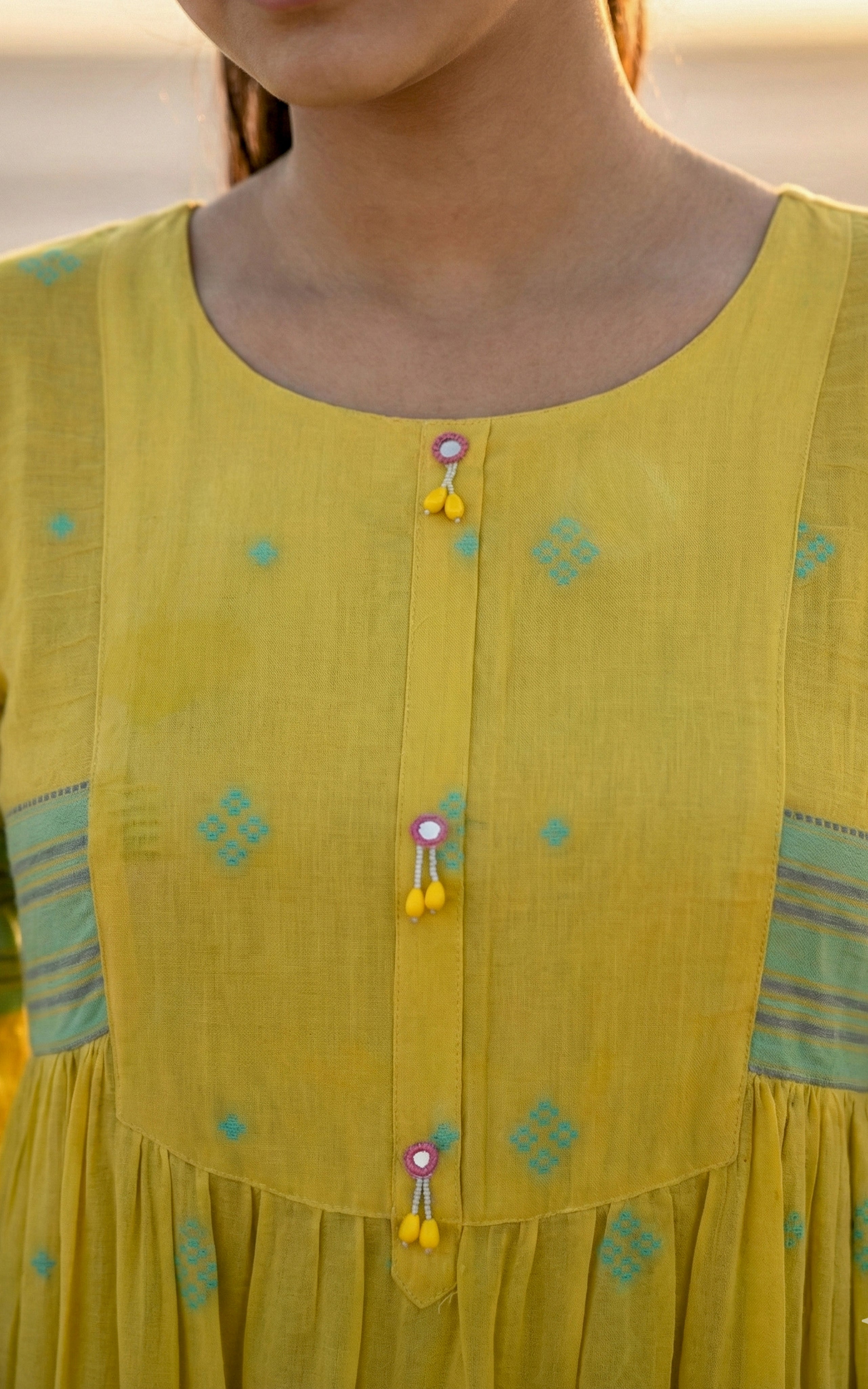 Instore - Yellow Color Cotton Tier Cut Kurti with Decorative Buttons with Cotton Lining