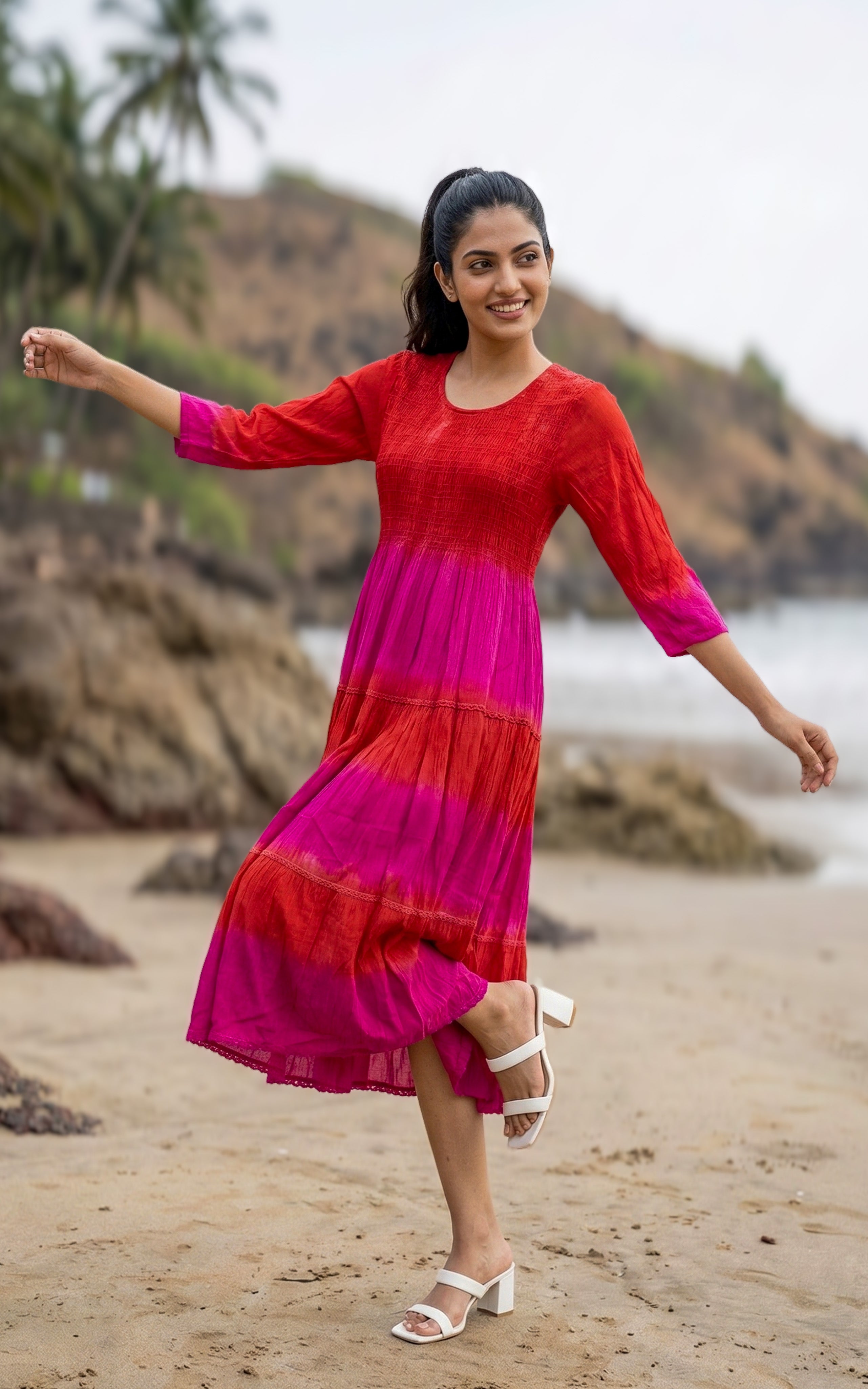 Red smocked Indo Western maxi dress made from viscose fabric.