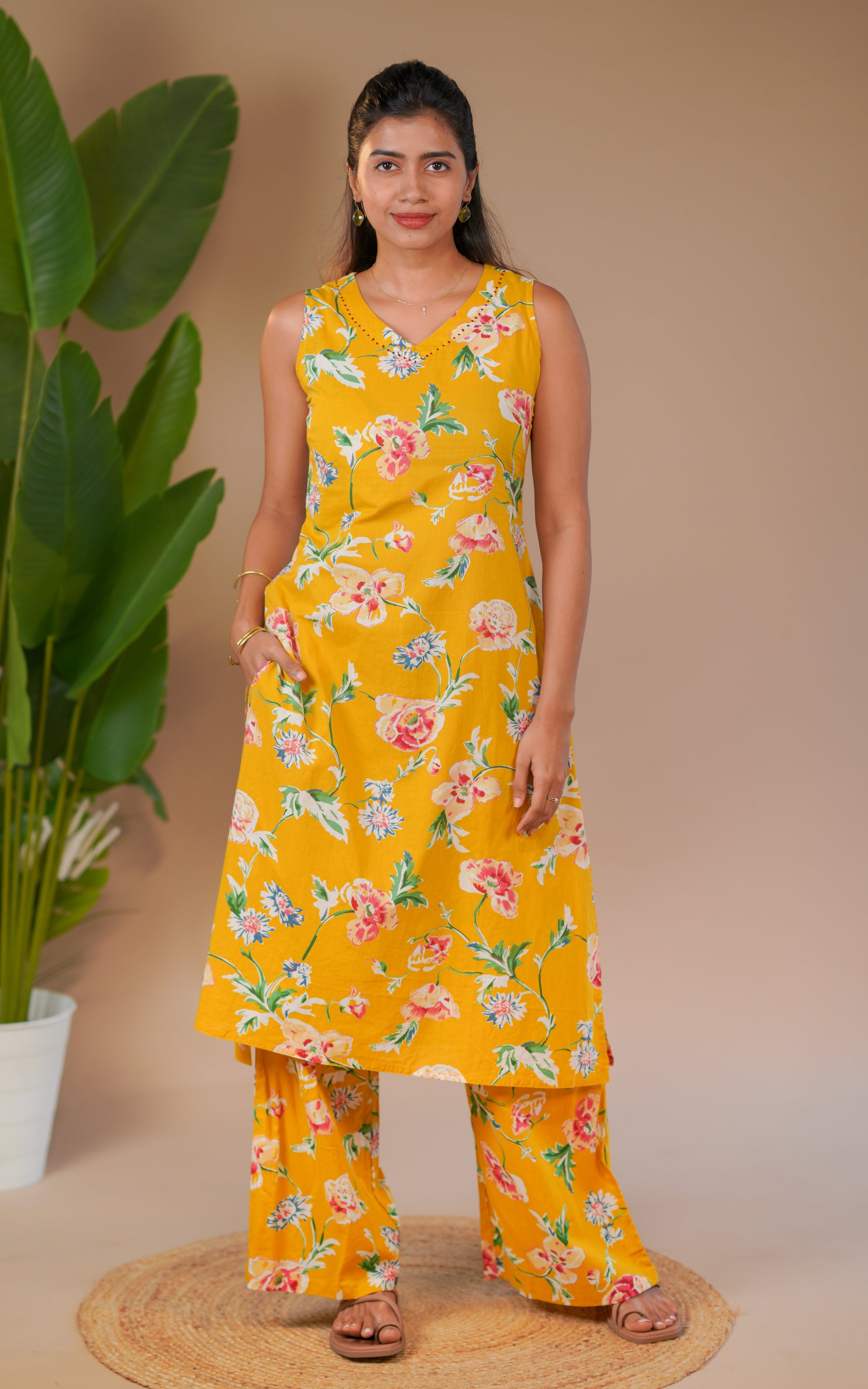 Bright yellow floral straight-cut kurta designed to give a vibrant and refreshing summer look.
